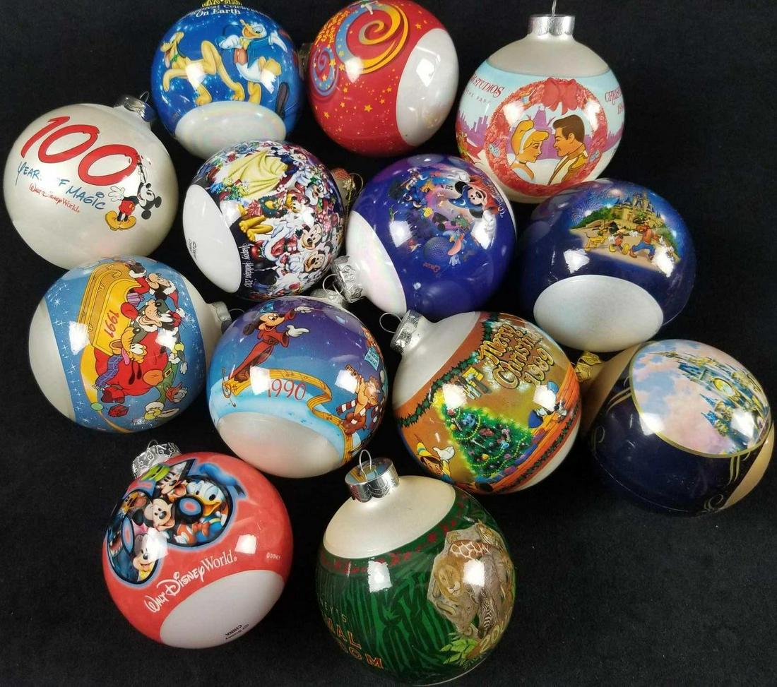 Lot of 13 Disney Christmas Glass Ball Ornaments: This lot includes 13 Disney 3" glass ball Christmas ornaments. All are in good used condition with no known damages besides normal wear scuffing. 1)2006 Walt Disney World Mickey and Friends. 1) 1994 D