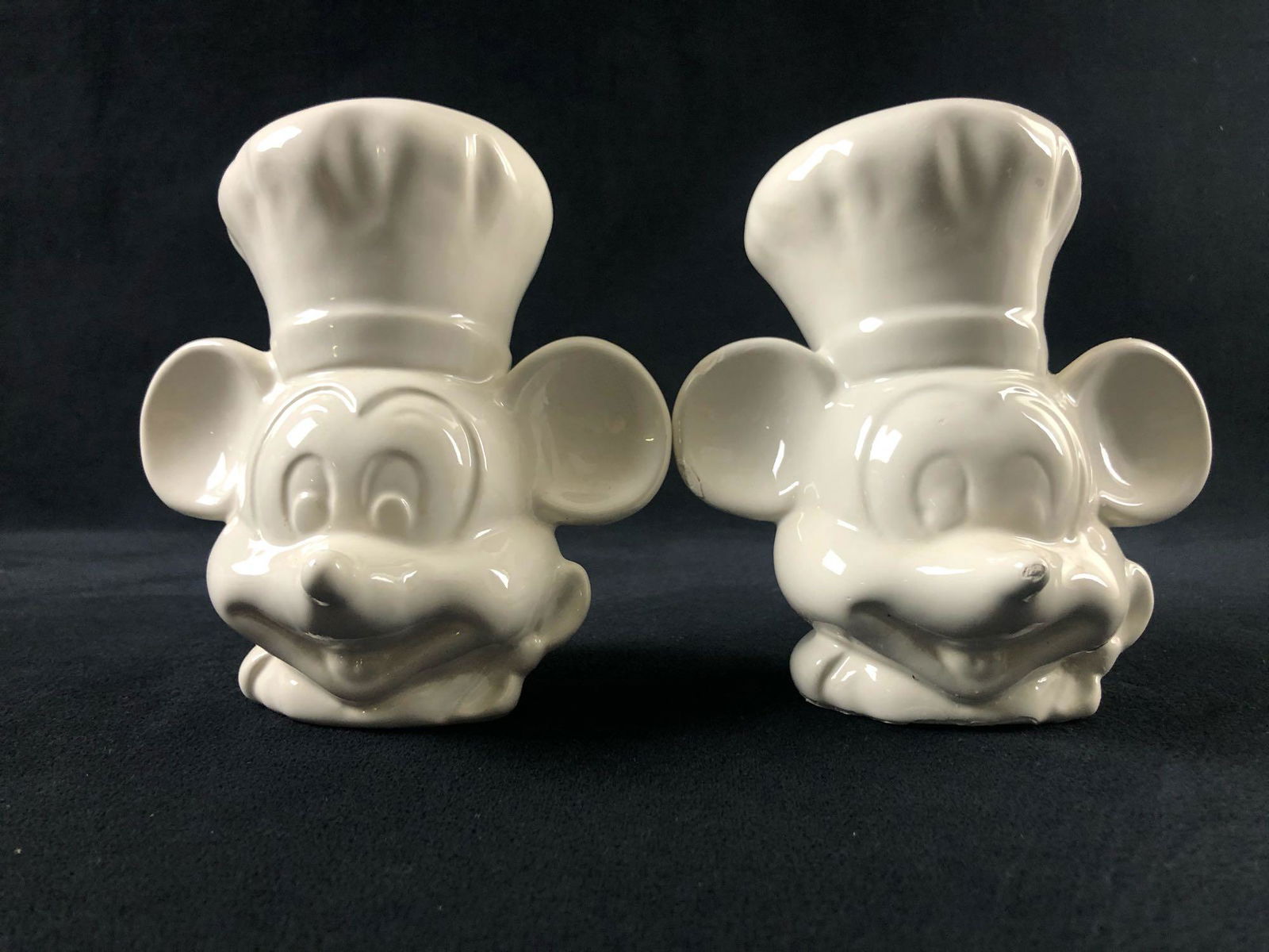 Vintage Chef Mickey Mouse White Salt Pepper Shakers: Vintage Chef Mickey Mouse White Salt Pepper Shakers Walt Disney Cooking Kitchen DecorÂ This lot features a set of unused salt and pepper shakers.Â The itemsÂ are in great used condition with no
