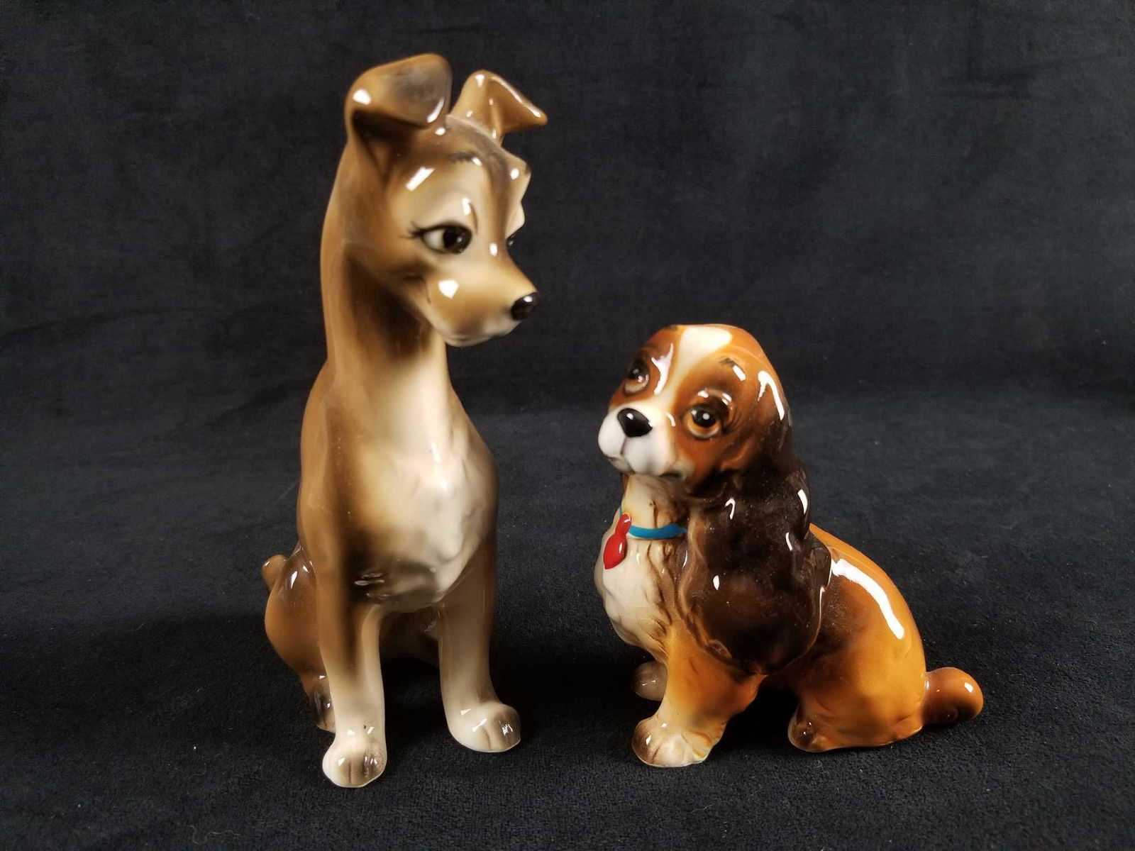 Disney Vintage Lady And The Tramp Hand Painted Glazed: Produced in Japan in the 1950/1960s. Ceramic figures are painted and then hand glazed. Lady is approx 4" x 2" x 4" and Tramp is approx 4" x 2" x 6". Both figures are in good, vintage condition with no