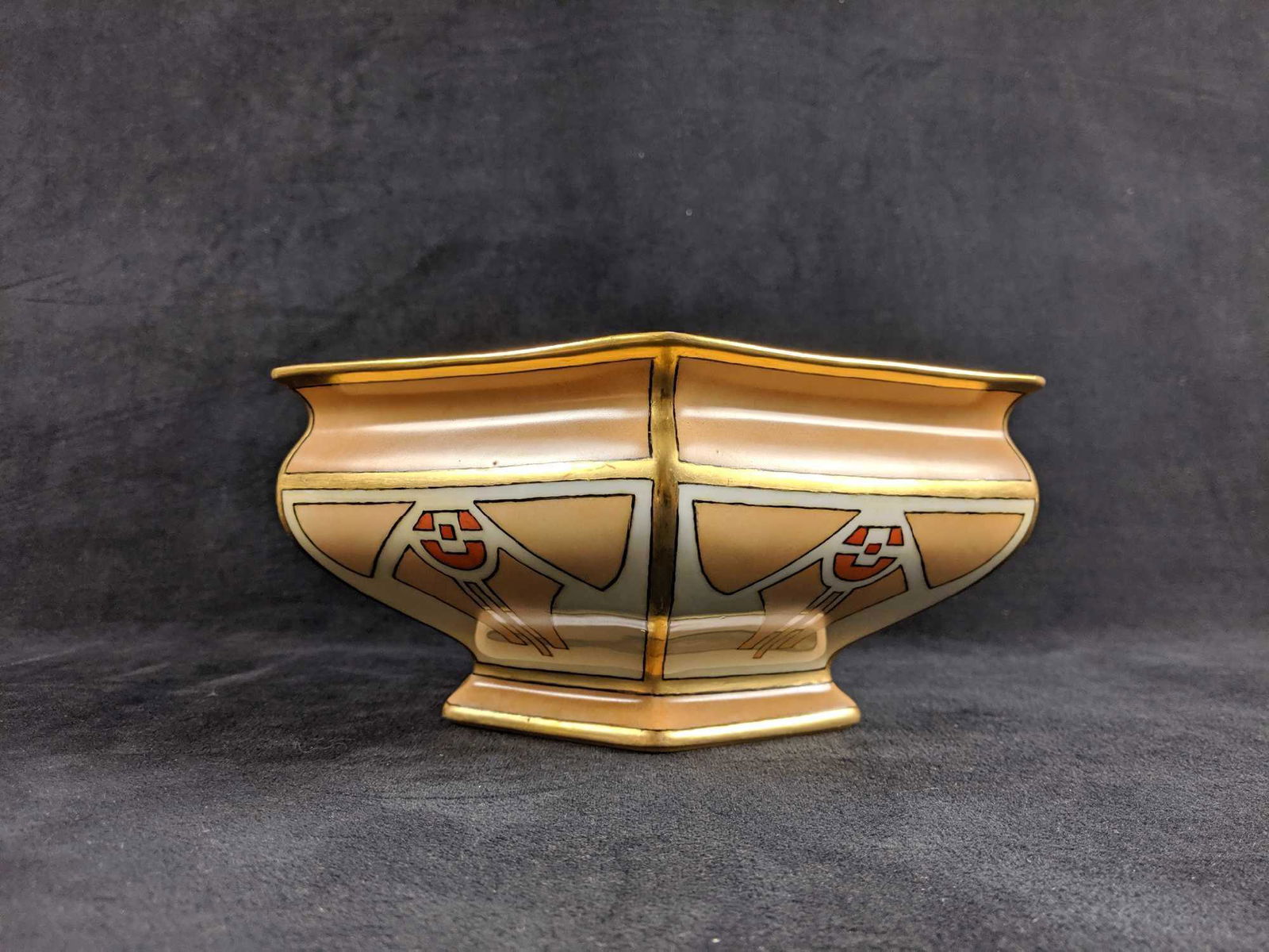Art Deco B and Co. Porcelain Certerpiece Bowl: Centerpiece Porcelain Bowl by Bernardaud & Co. Limoges, France. This Bowl has a hexagon shape and is hand paintedÂ with art deco patterns. The bowl is dated 1911 on the bottom along with the B & C l