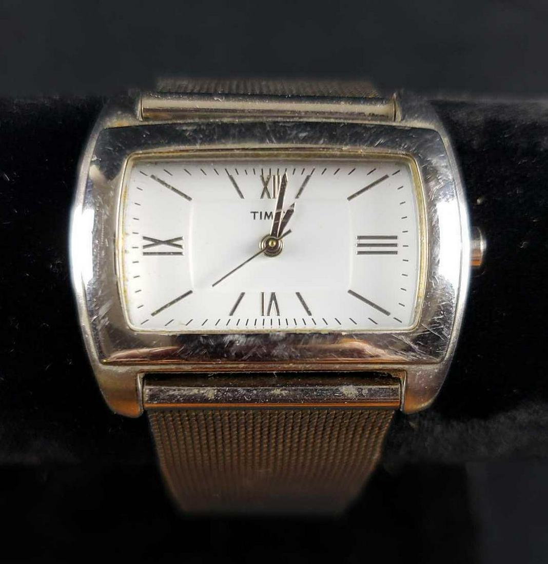 Men's Timex Dress Watch: Timex , SR - 521 SW Silver Band, Stainless Steel It is in fair used condition. Watch has not been tested and may need a battery. Â