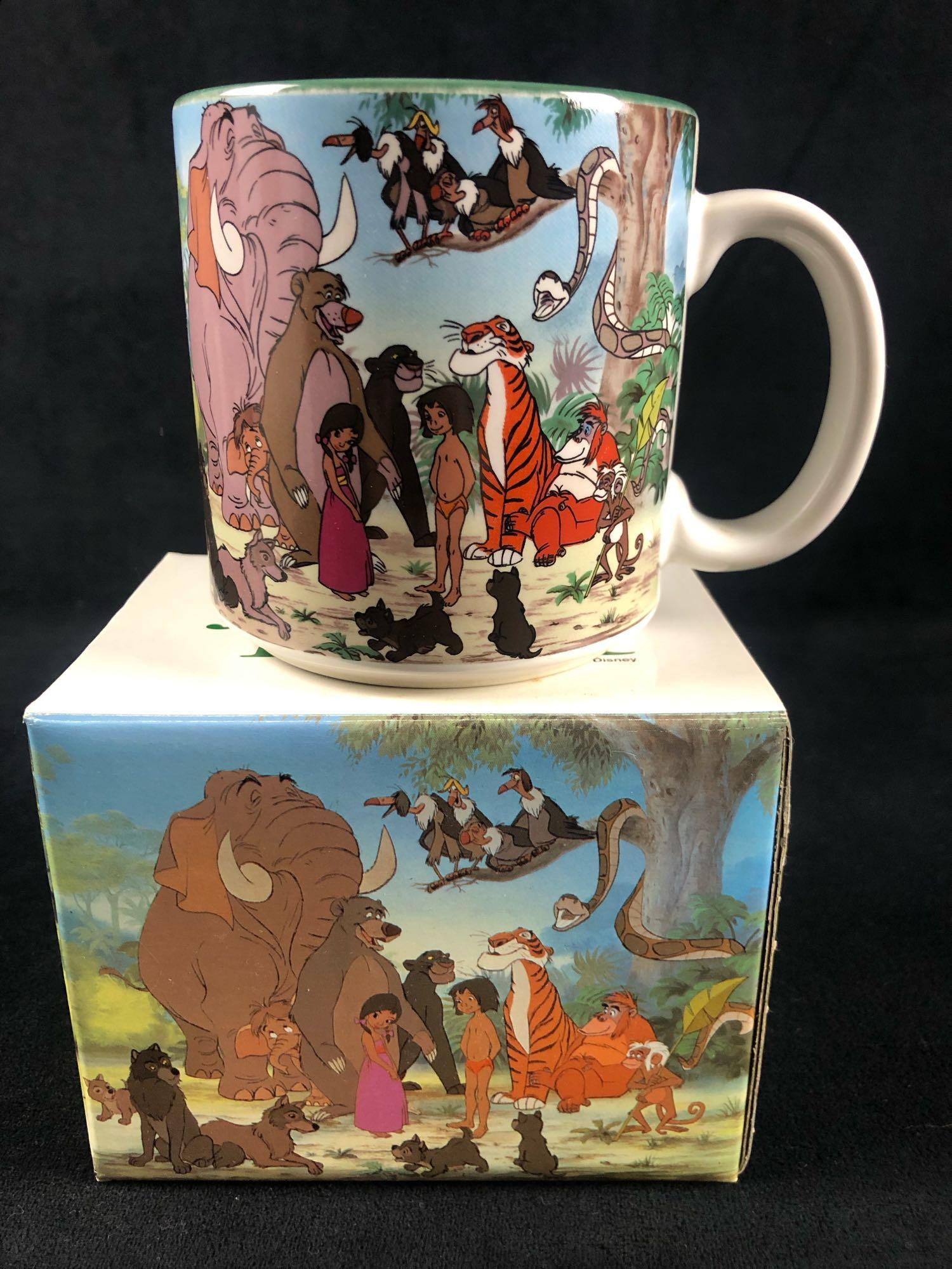 Vintage Walt Disney Classic Jungle Book Mowgli Baloo: Vintage Walt Disney Classic Jungle Book Mowgli Baloo Kaa Bagheera Shere Khan Coffee Mug Cup The souvenir mug is made from ceramic and features a colorful movie scene from Jungle Book. The mug is in gr