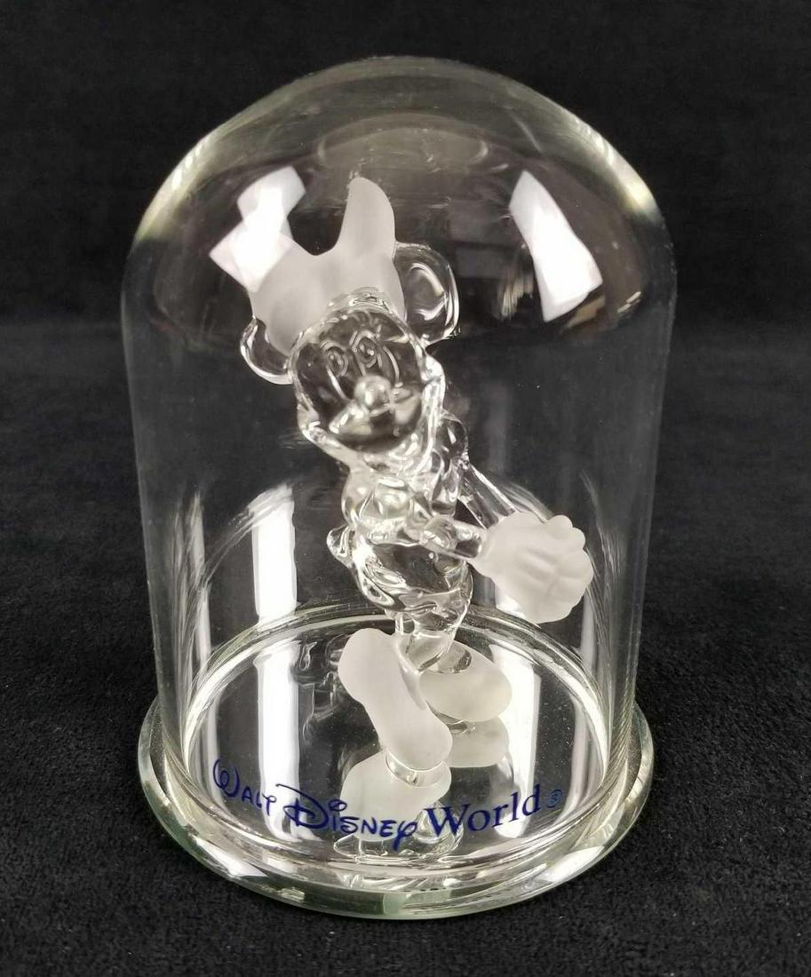 Walt Disney Minnie Mouse Glass Souvenir by Arribas: Sparkling in her traditional dress and bow, Minnie's glass sculpture makes a charming souvenir of your Walt Disney World visit. Created by Arribas Brothers, this delicate miniature with mirrored base 