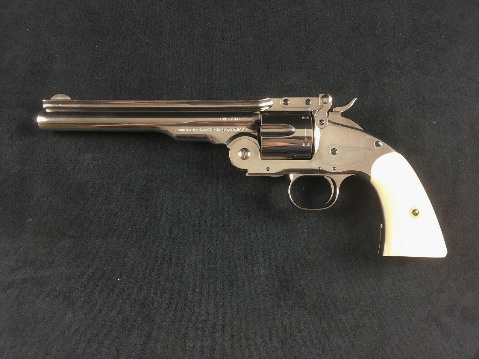 45 Caliber StoegerÂ Top Break Revolver Pistol: 45 Caliber StoegerÂ Top Break Revolver Pistol; a nickel plated US Cavalry Colt 45 model six shooter by Stoeger. It is well marked including reference to Major George Wheeler Schofield's pattens of 1