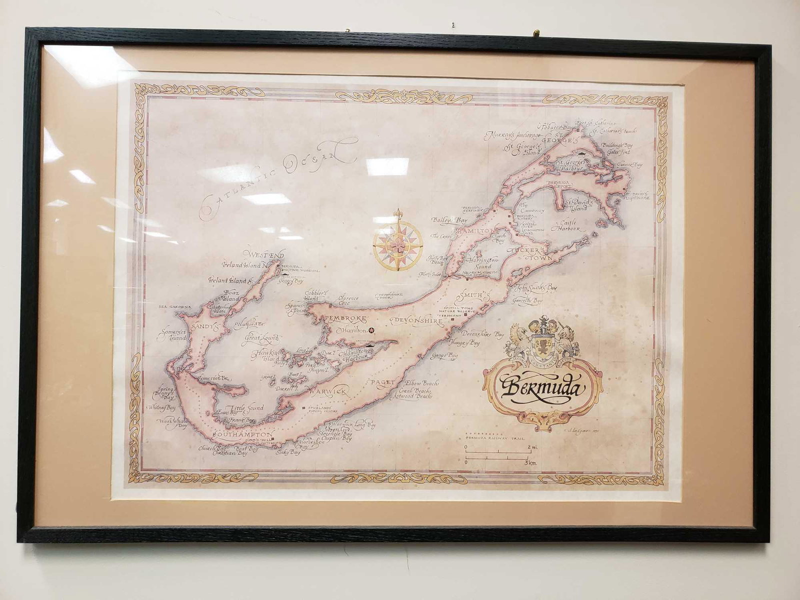 J. Longacre Bermuda Framed Map: J. Longacre Bermuda Framed Map. This map is in great condition. There is a tiny amount of warping on the paper. The map shows a large image of Bermuda with a compass. It measures 26" x 37" with the fr