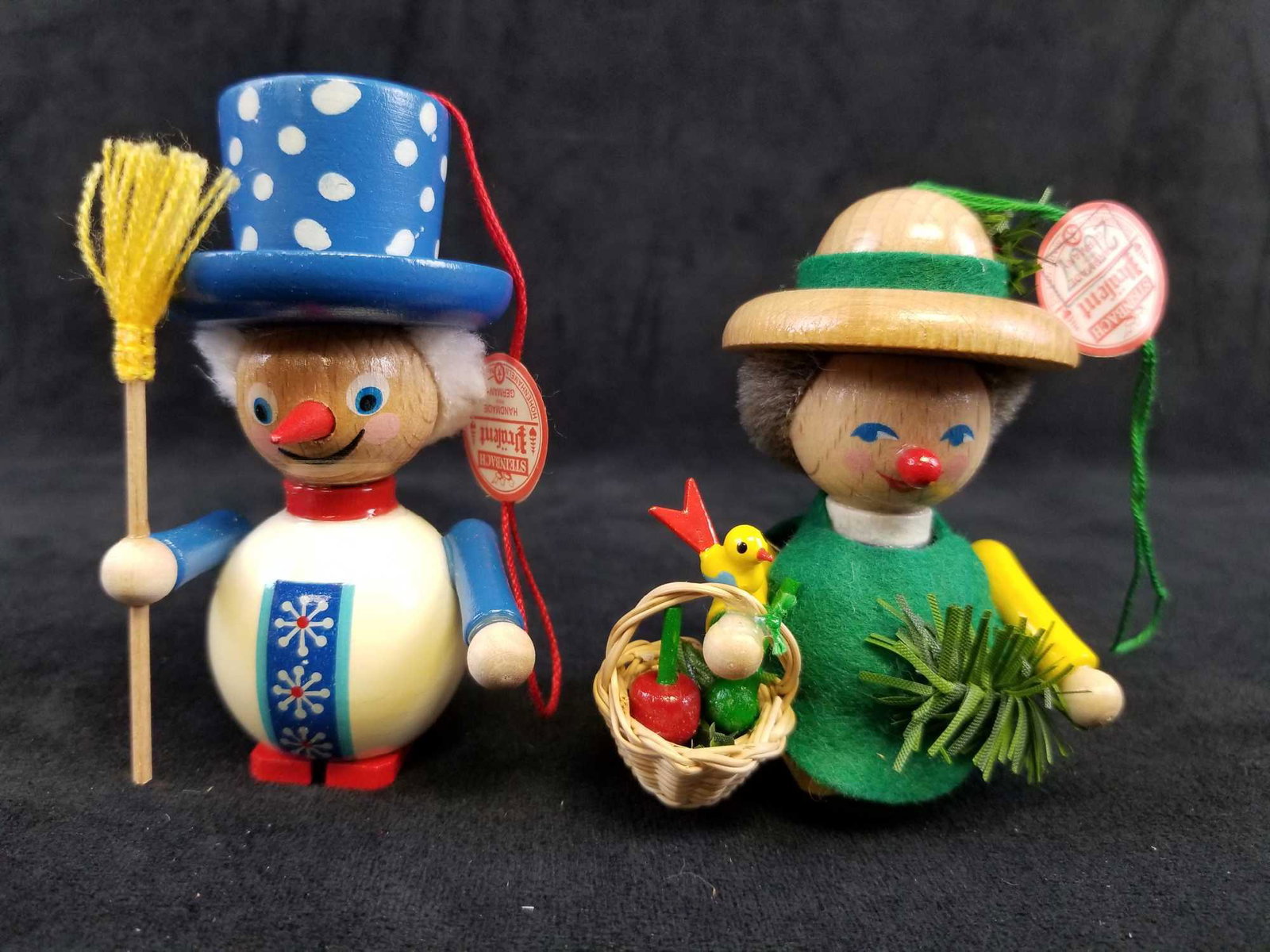 Set of 2 Steinbach GMBH German Wooden Toy Ornaments B: This set features unique handmade wooden toys from Germany that show great detail and personality. In it's original box, these ornaments appear to be in mint condition with no known damages. Â