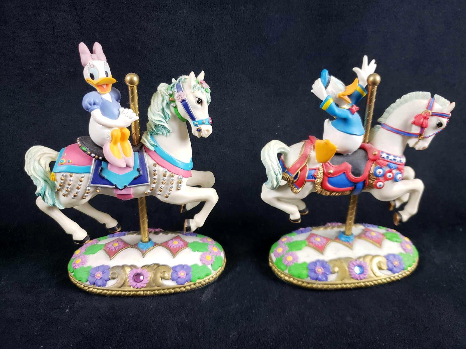 Lot of 2 Vintage Donald and Daisy Duck Mickeys Carousel: Lot of 2 Vintage Donald and Daisy Duck Mickeys Carousel Figurines. This set of two figurines is in overall great used condition. Both items have no known signs of damage such as chips or cracks in the