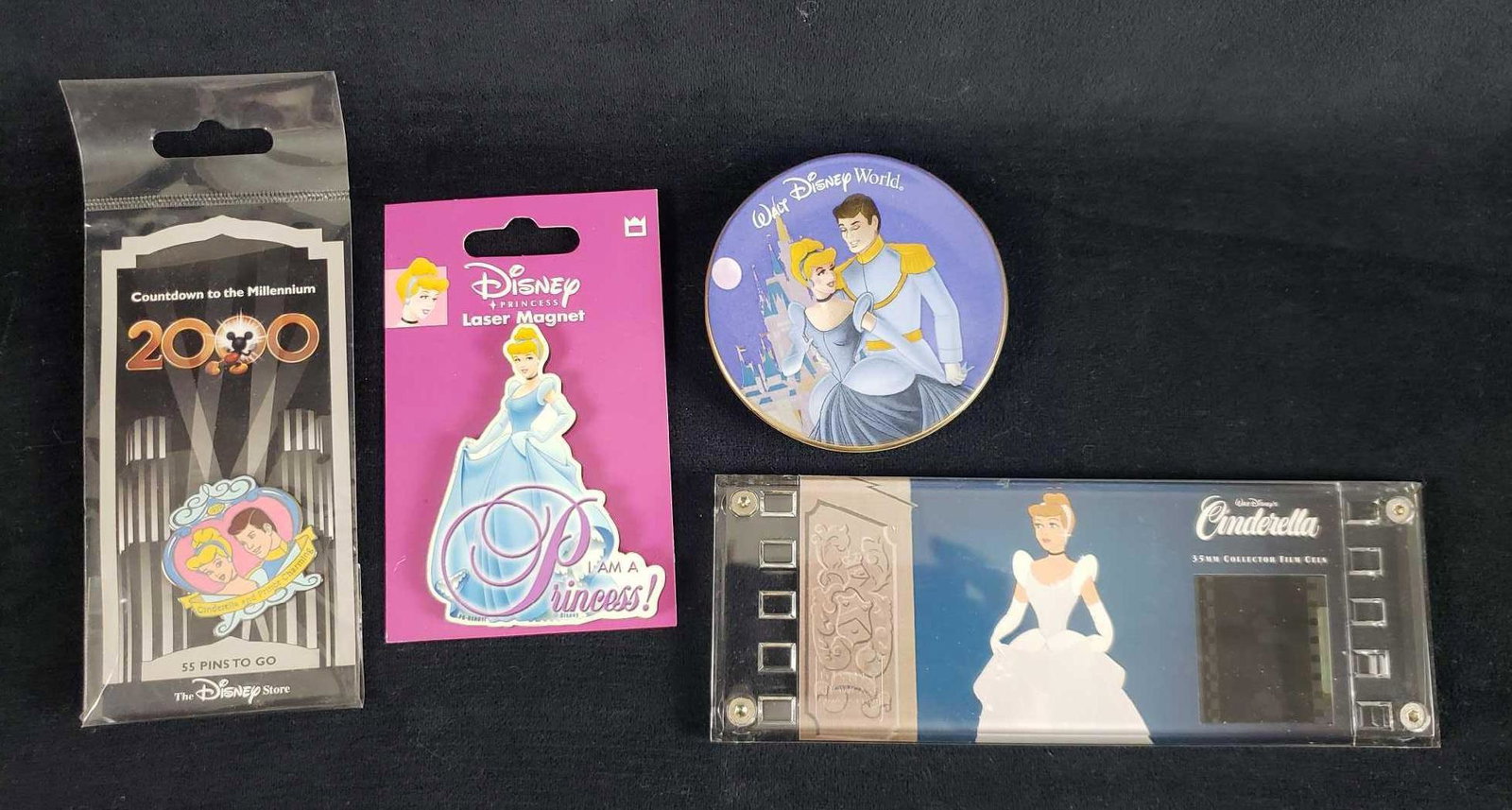 Lot of 4 Disney Collectible Cinderella Items: Lot of 4 Disney Collectible Cinderella Items. These vintage Disney Cinderella memorabilia items are in overall great condition. The items included in this lot are: 1 Disney Princess Cinderella "I am a