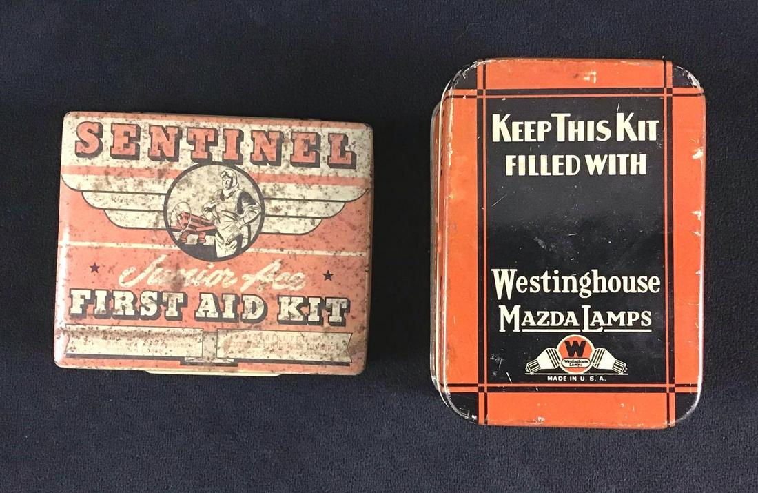 Lot of 2 Vintage 1900s Tins Sentinel First Aid Kit and: These are vintage pieces. They are in good condition with known ware and scuffs. The light bulbs are untested. In total this lot consists of the following; (1) Westinghouse MazdaLamps. This has six li