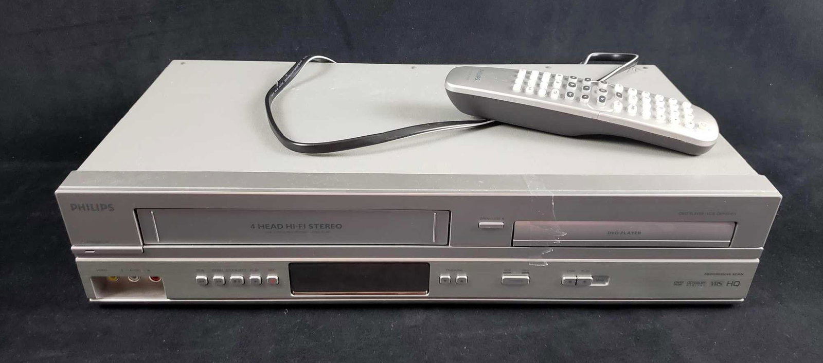 Phillips Vintage DVD and VCR Player: Phillips Vintage DVD and VCR Player. This DVD and VCR player is in good to great used condition. It is untested but does not appear to have any obvious damage. The remote is included. Measures 17.25"