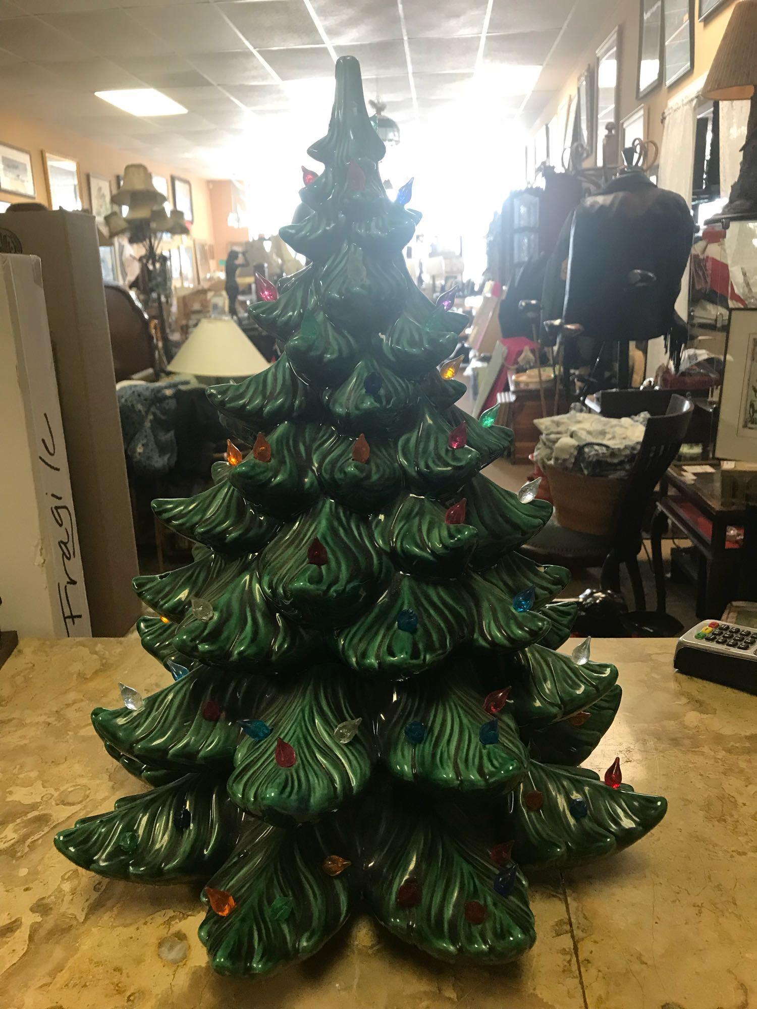Vintage Ceramic Christmas Tree: This tree stands approx. 21” in height and 16” in diameter. It appears to be in very good used condition with none known chips or cracks. It is missing several of the bulbs (around 13-15 m