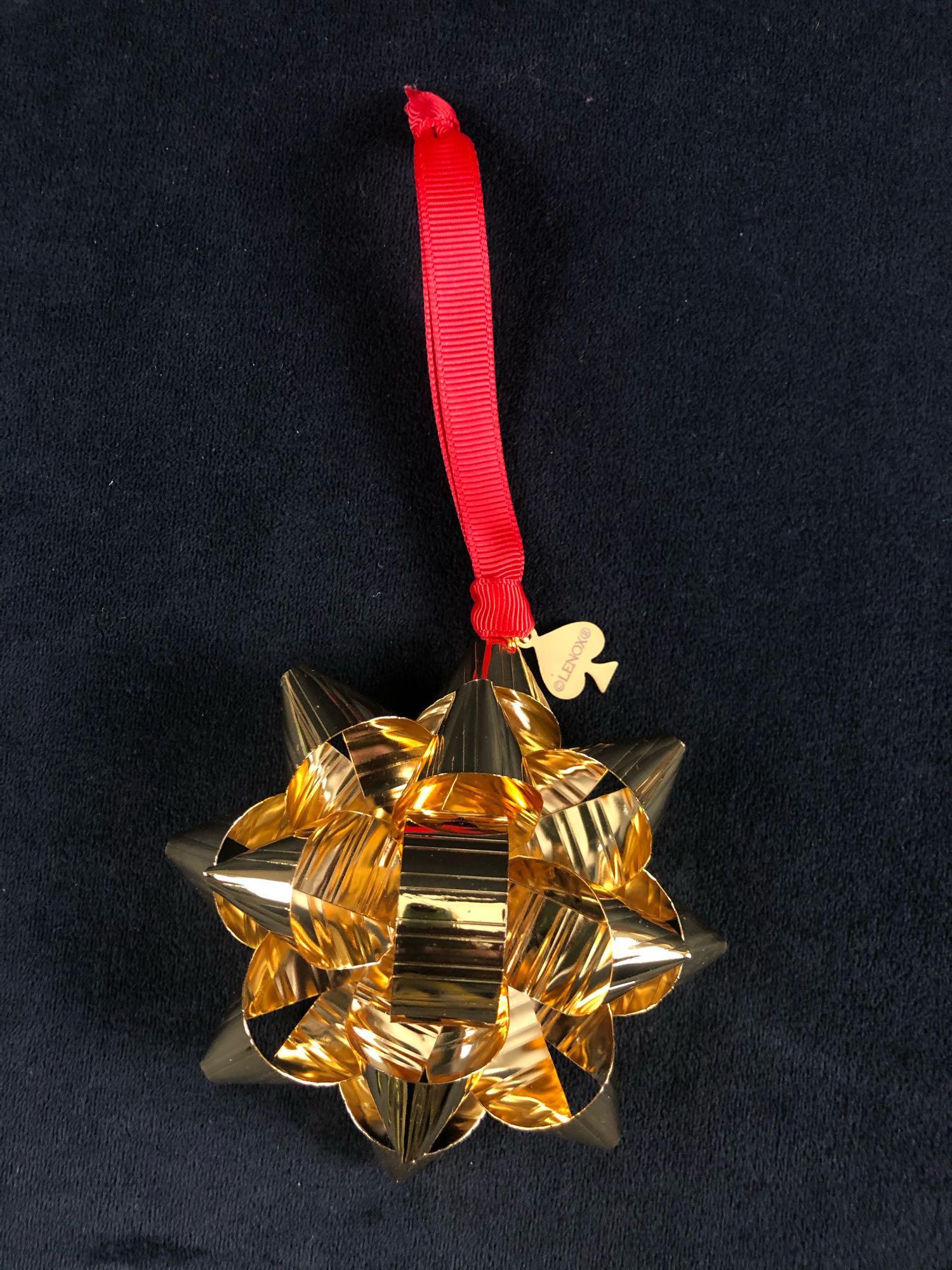 Lenox Kate Spade Bow Ornament: Lenox Kate Spade Tinsel Topper Gold Bow Christmas OrnamentÂ This listing features Lenox Kate Spade American by Design Tinsel Topper Gold Ornament.Â . In very good condition with no known damages 