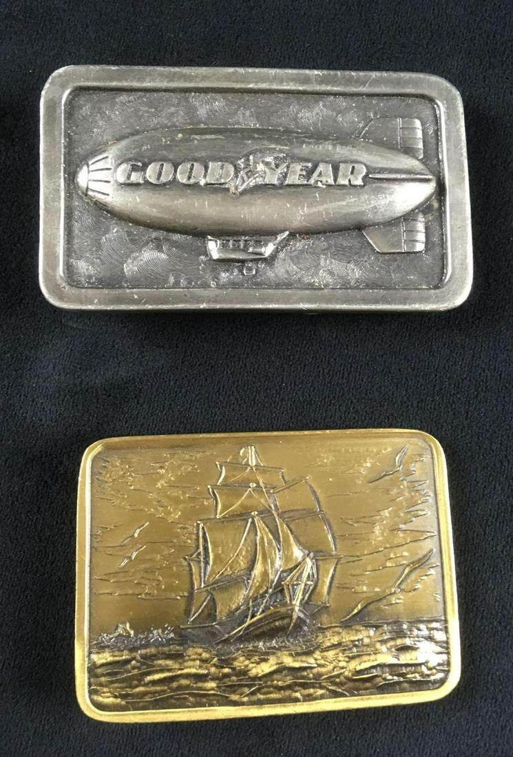 Two Vintage Metal Belt Buckles: Two Vintage Metal Belt Buckles. These two belt buckles are in great condition. The Goodyear belt buckle has some scratches on the front surface and needs to be cleaned. The other belt buckle features 