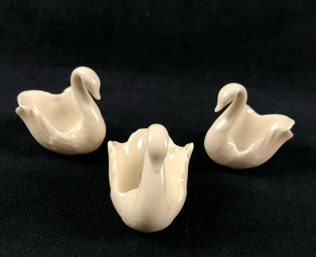 Lot Of 3 Lenox Vintage Swan To The Birds China: The three small swans from Lenox are marked in the color gold on the base of the birds. Appears to be from the 1980s. There are no known cracks, chips or crazing. The items have some known scuff marks