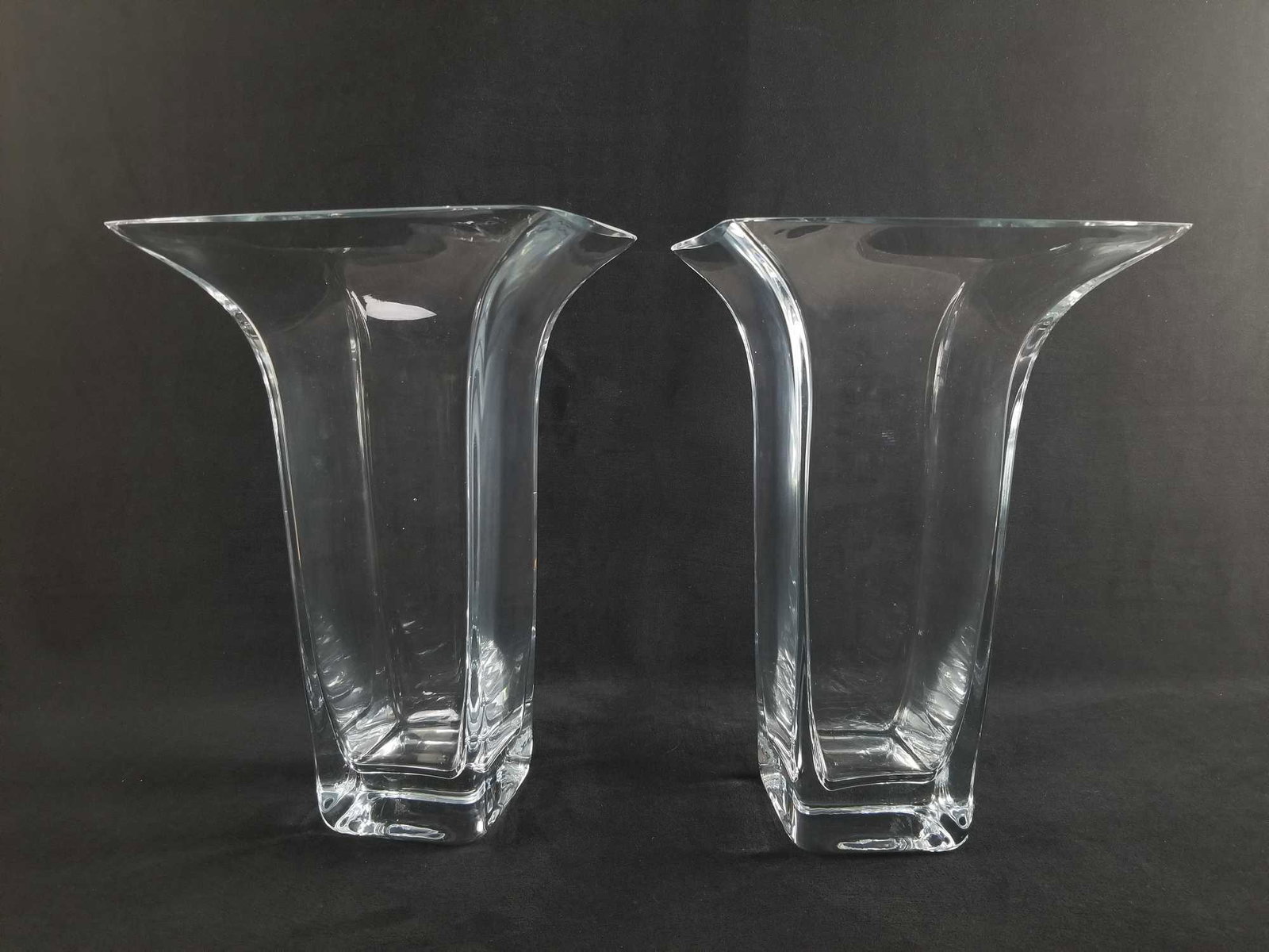 Lot of 2 Large Modern Glass Flared Vases: They have a beautiful squared flare. They appear to be crystal due to its clarity and weight. You can make beautiful arrangements with these pieces. They have some known damages as in dime to quarter 