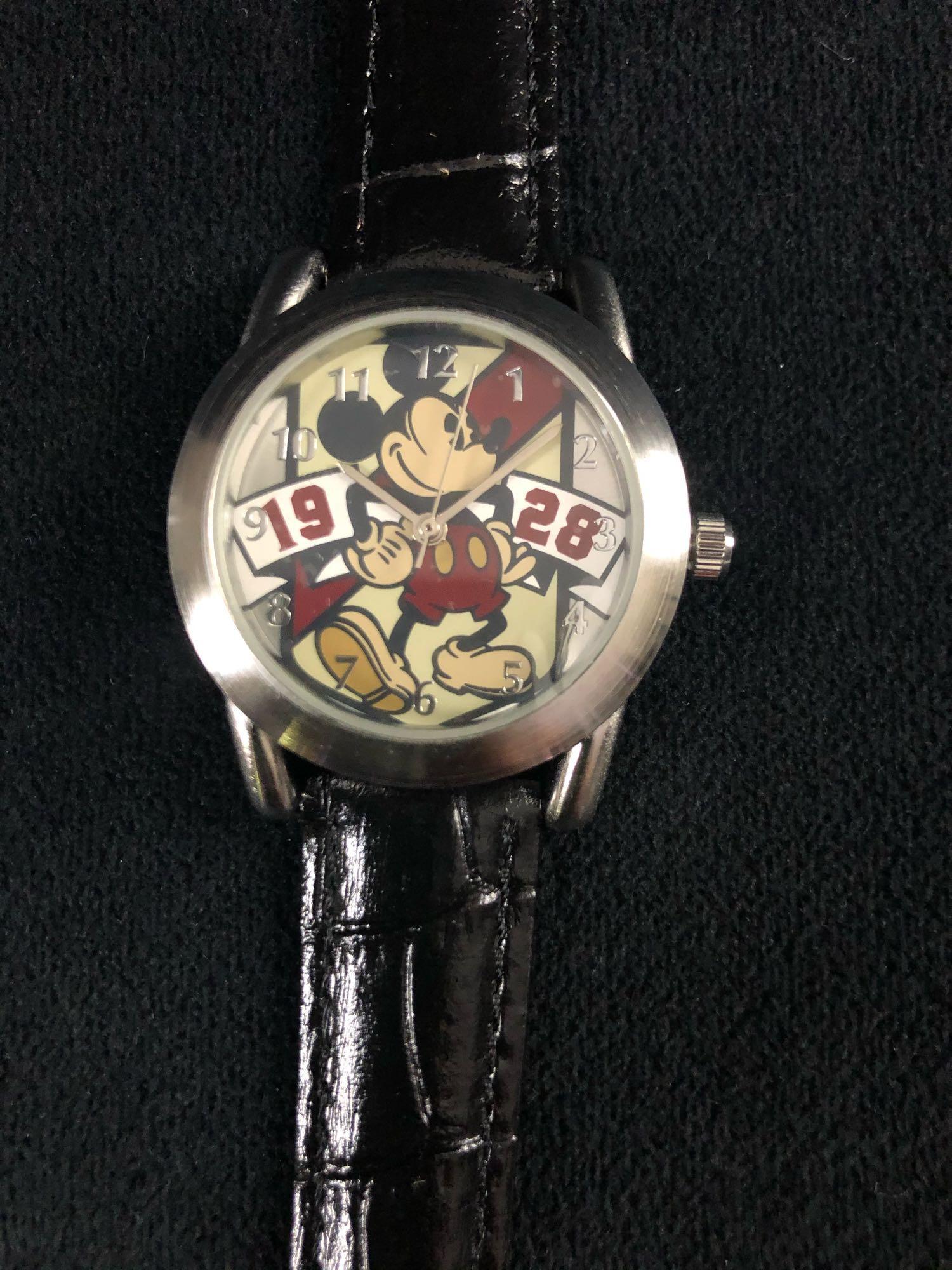 Vintage Disney Parks Mickey Mouse 1928 Limited Release: Vintage Disney Parks Mickey Mouse 1928 Limited Release Watch This is a limited edition Disney Parks Mickey Mouse watch. This watch is in great condition with no known damages; may need a battery repla