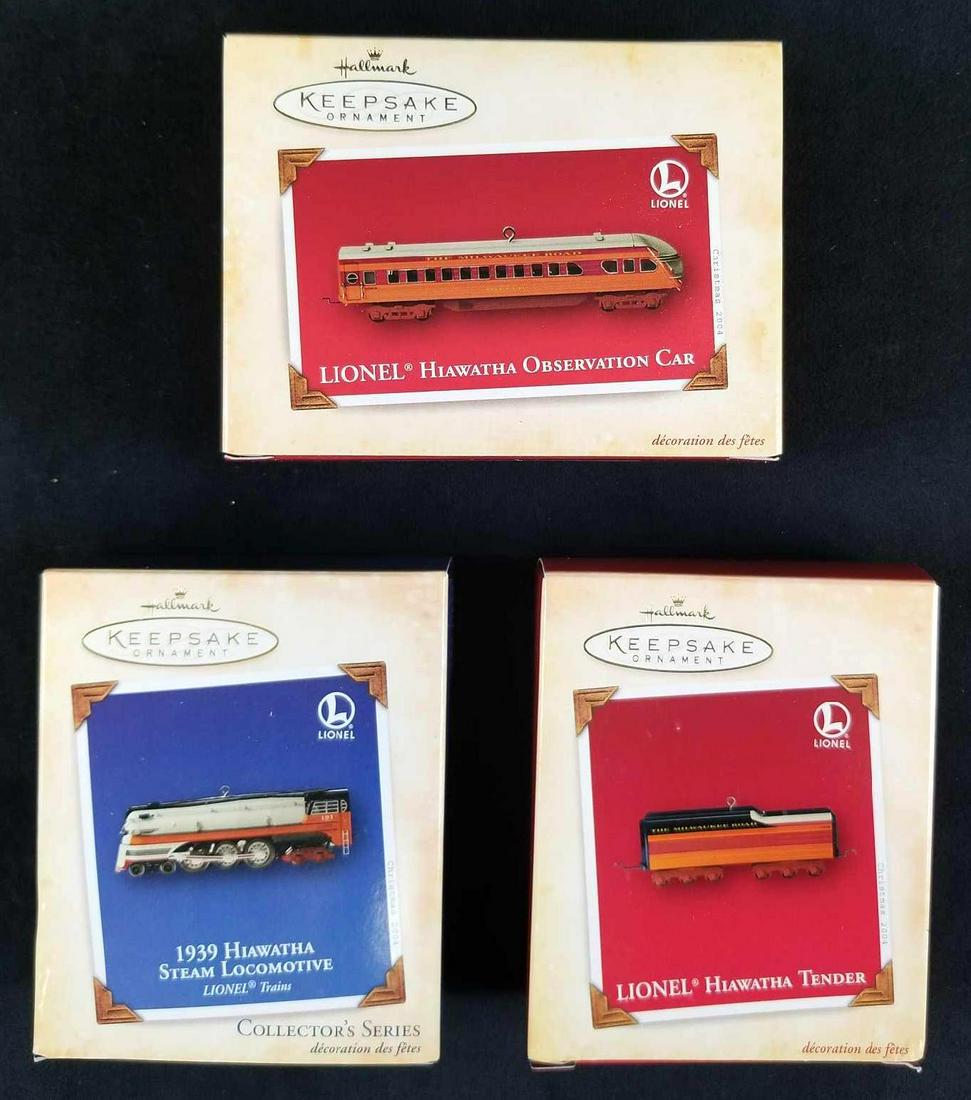 Set of 3 Lionel Hiawatha Collectible Ornaments by: This set includes: Lionel Hiawatha Observation Car; Die- Cast Metal -dated 2004, 1934 Hiawatha Steam Locomotive Lionel Train; Die Cast Metal and dated 2004 and Lionel Hiawatha Tender; Die-Cast Metal a