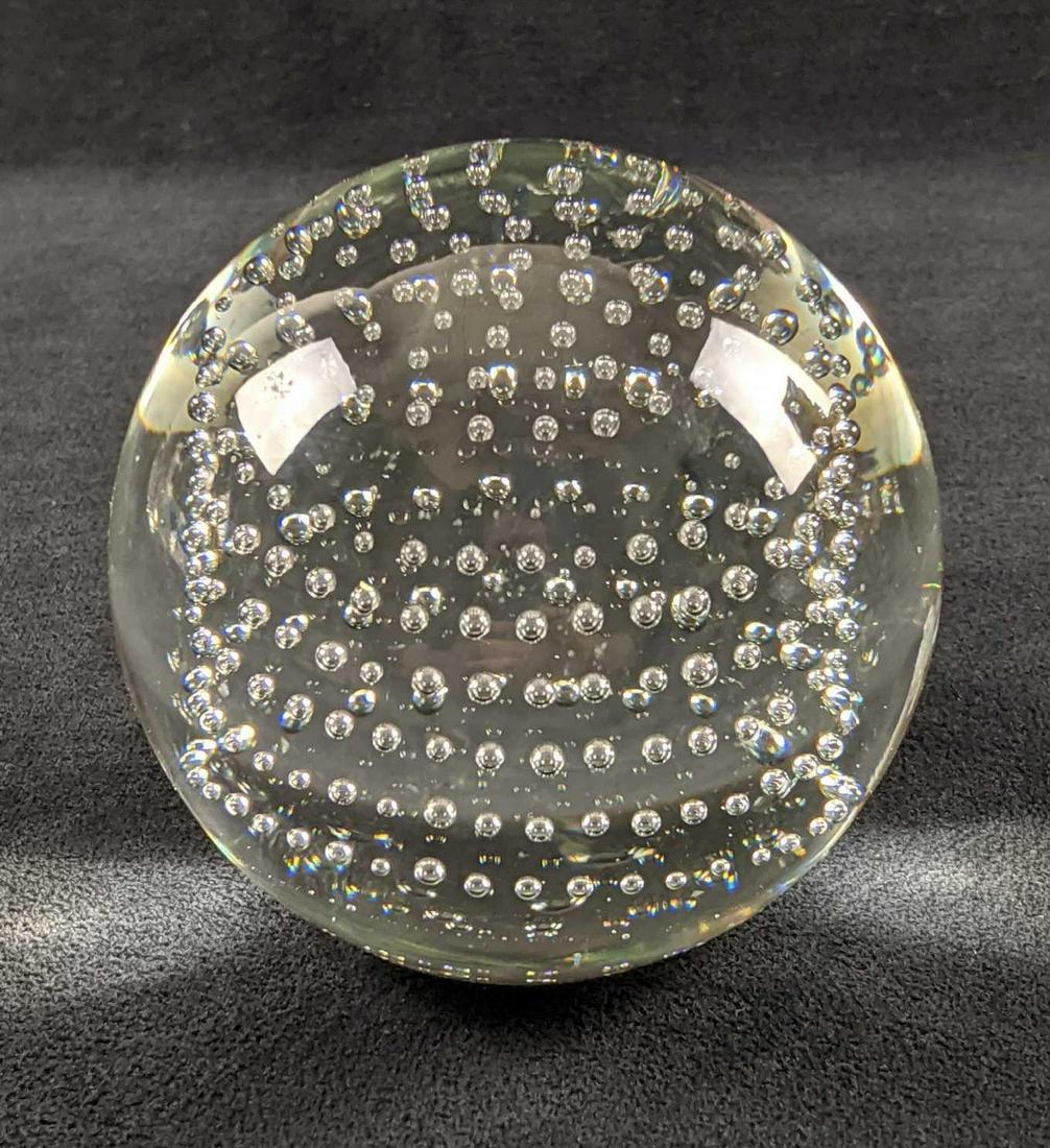 Art Glass Paperweight With Controlled Bubbles: Hand blown glass paperweight with controlled bubbles. Would look really good on an light base. Paperweight is in good, used condition with light wear/chips around bottom edge. There are also light scu