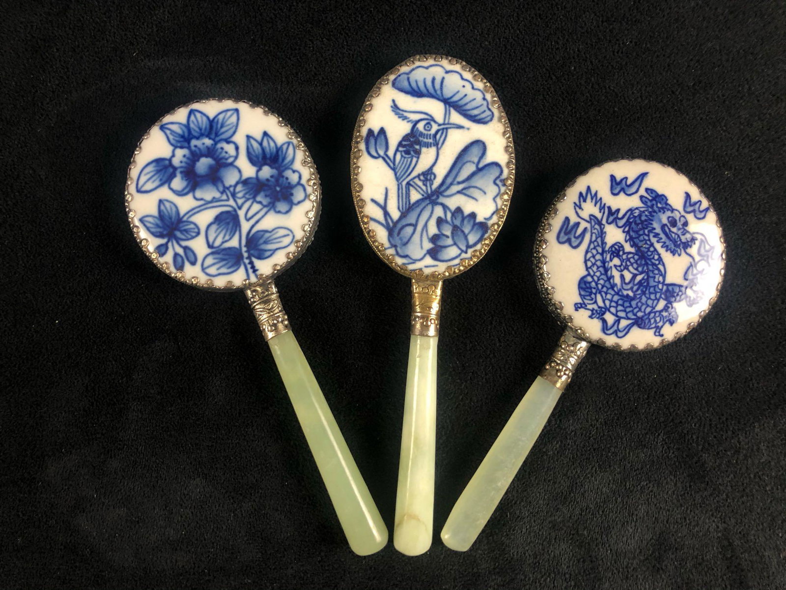 Jadeite Chinese Art Porcelain Mirrors Lot Of 3: Jadeite Chinese Art Porcelain Mirrors Lot Of 3. Beautiful handcrafted and hand-painted porcelain mirror with silver plate frame and solid jade handle. There are no known cracks or chips in the mirror.