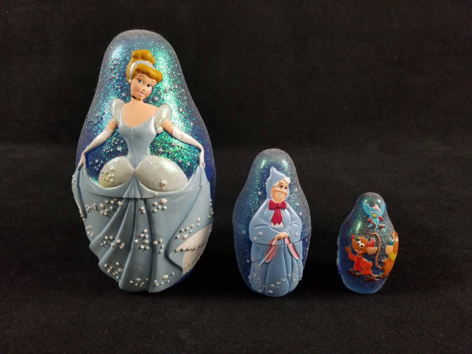 Disney Cinderella Nesting Doll: Nesting doll from Disney's Cinderella. Made of a colorful and very durable plastic. This measures approx 3" x 3" x 6". Nesting figure is in good, used condition with no noticeable markings or scratche