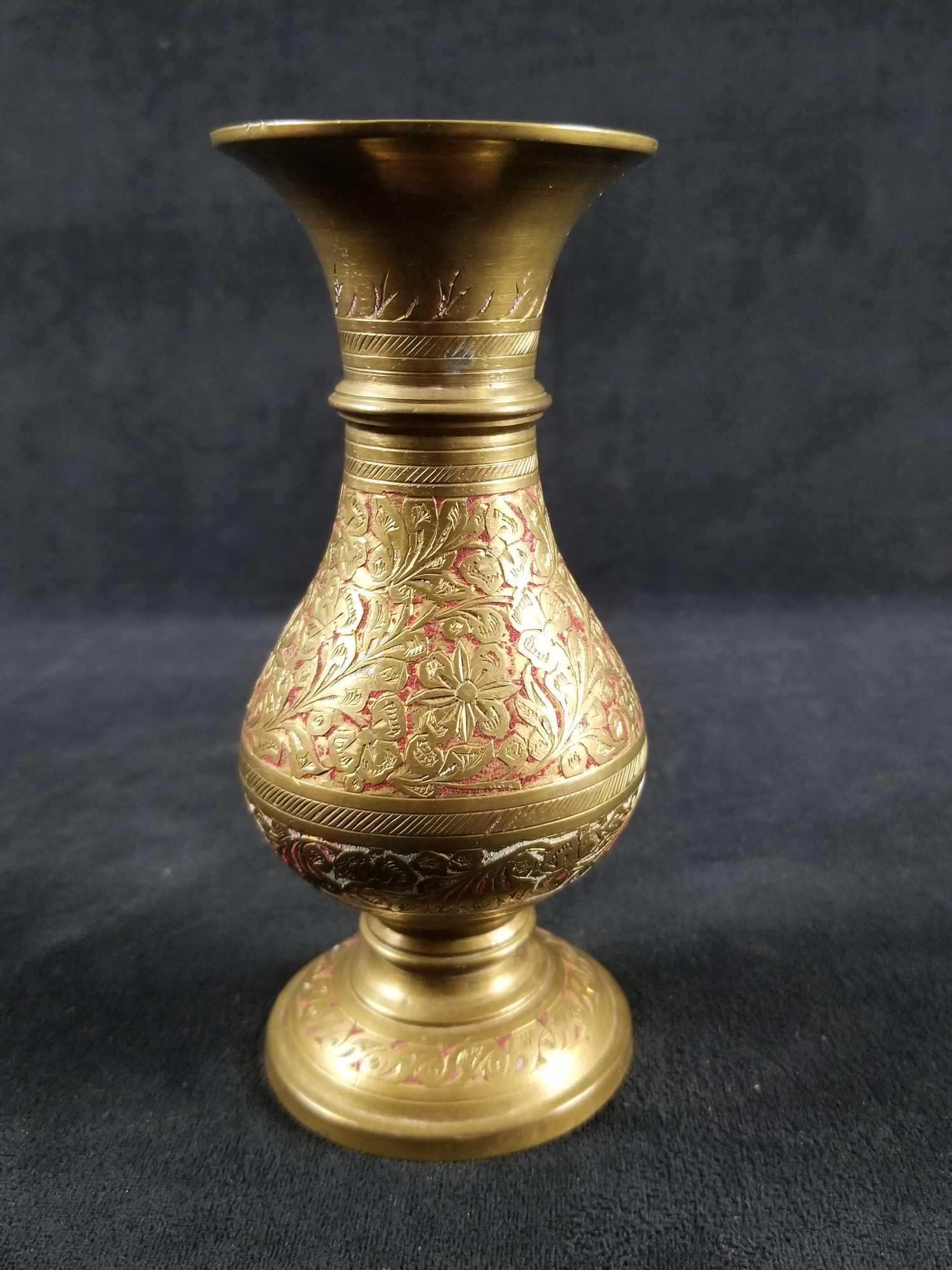 Brass Vase With Flower Etching From India: Heavy solid Brass Vase decorated from India with intricate etched leaf & flower design with faded red & white accents. This vase is etched India underneath and is in good condition with minor tarnishi
