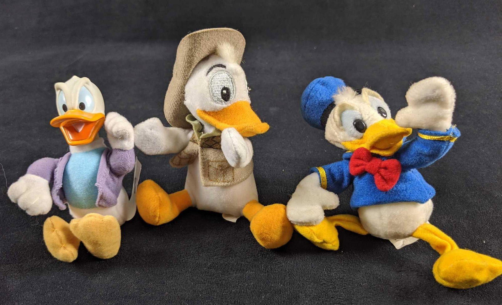 Disney VIntage Mini Plush Donald Ducks: This lot includes three mini Donald Duck plush dolls. This includes on 'House Of Mouse' Donald, this measure approx 2" x 2" x 4". And two plush mini figures with magnetic hands that can be used to hav