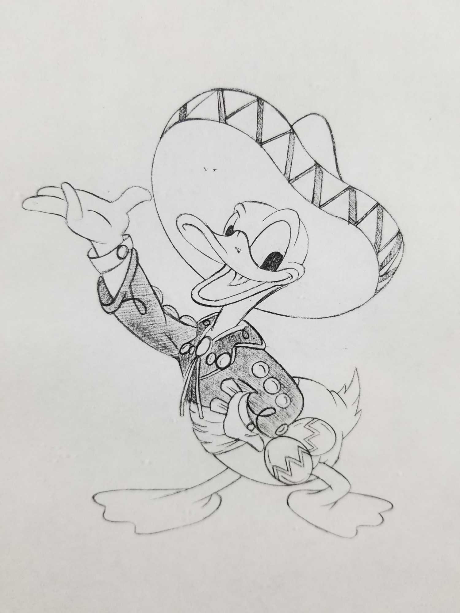 Framed Mariachi Donald Duck Black And White Print: Framed black and white print of Donald Duck. He is wearing a mariachi outfit and holding some maracas on one hand. The word Mexico is on the lower left side of the print. The print has some ink markin