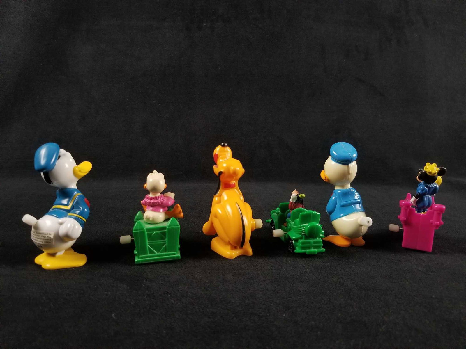 A Lot of 6 Vintage Miniature Mini Plastic Wind Up Toys: A Lot of 6 Vintage Miniature Mini Plastic Wind Up Toys Mickey Goofy Pluto Donald Burger King This is a working lot of wind up toys from a private collectionÂ hold some are from the Burger King kids 