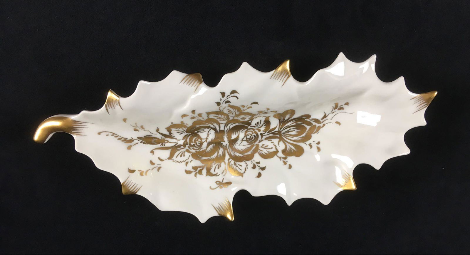 Vintage Fine Porcelain Trinket Dish with Gold Accent: Vintage Fine Porcelain Trinket Dish with Gold Accent, Marked; a very nice white porcelain holly leaf shaped trinket dish. It shows the Pate de Limoges mark. The dish is accented and decorated in gold