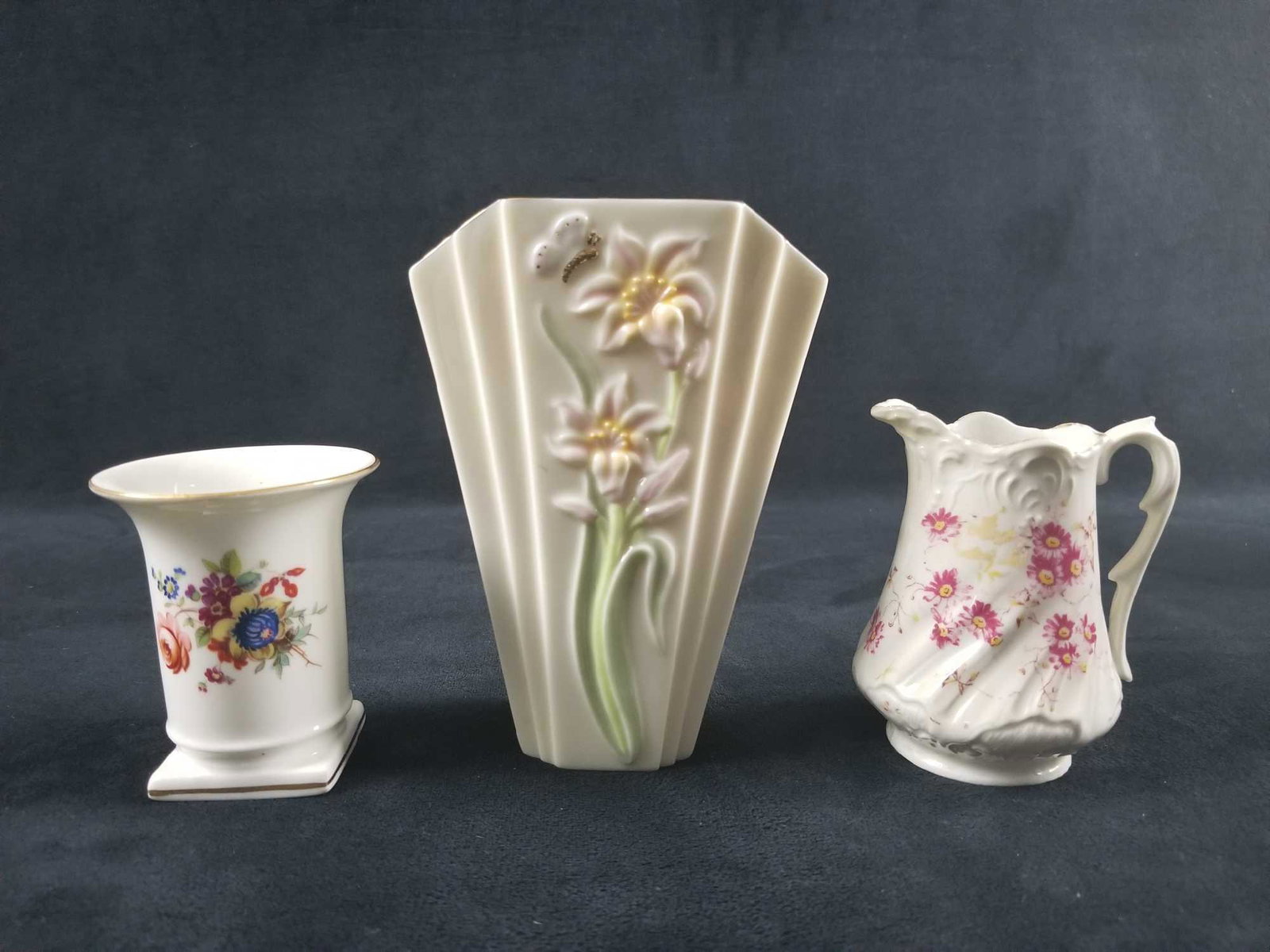 lot of 3 Vintage Porcelain: 1) This appears to be a small vintage Lenox porcelain vase. It states it was handcrafted in china. It is off white with pastel colors on the floral and butterfly details. The gold color accents the ri