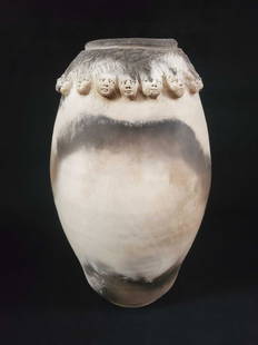 Women Heads Pottery Vase by Kimsey: This unique pottery vase by Kimsey depicts women's heads with their "hair" flowing upwards towards the opening. This piece is signed underneath and is in very good condition with no known damages. It