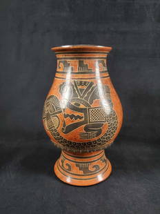 Nicaraguan Pottery Vase by Juan Jose of San Juan De: This Nicaraguan pottery vase signed Juan Jose of San Juan de Oriente Nicaragua underneath depicts a red clay colored vase with black designs of what appears to be an abstract form of a gator. This