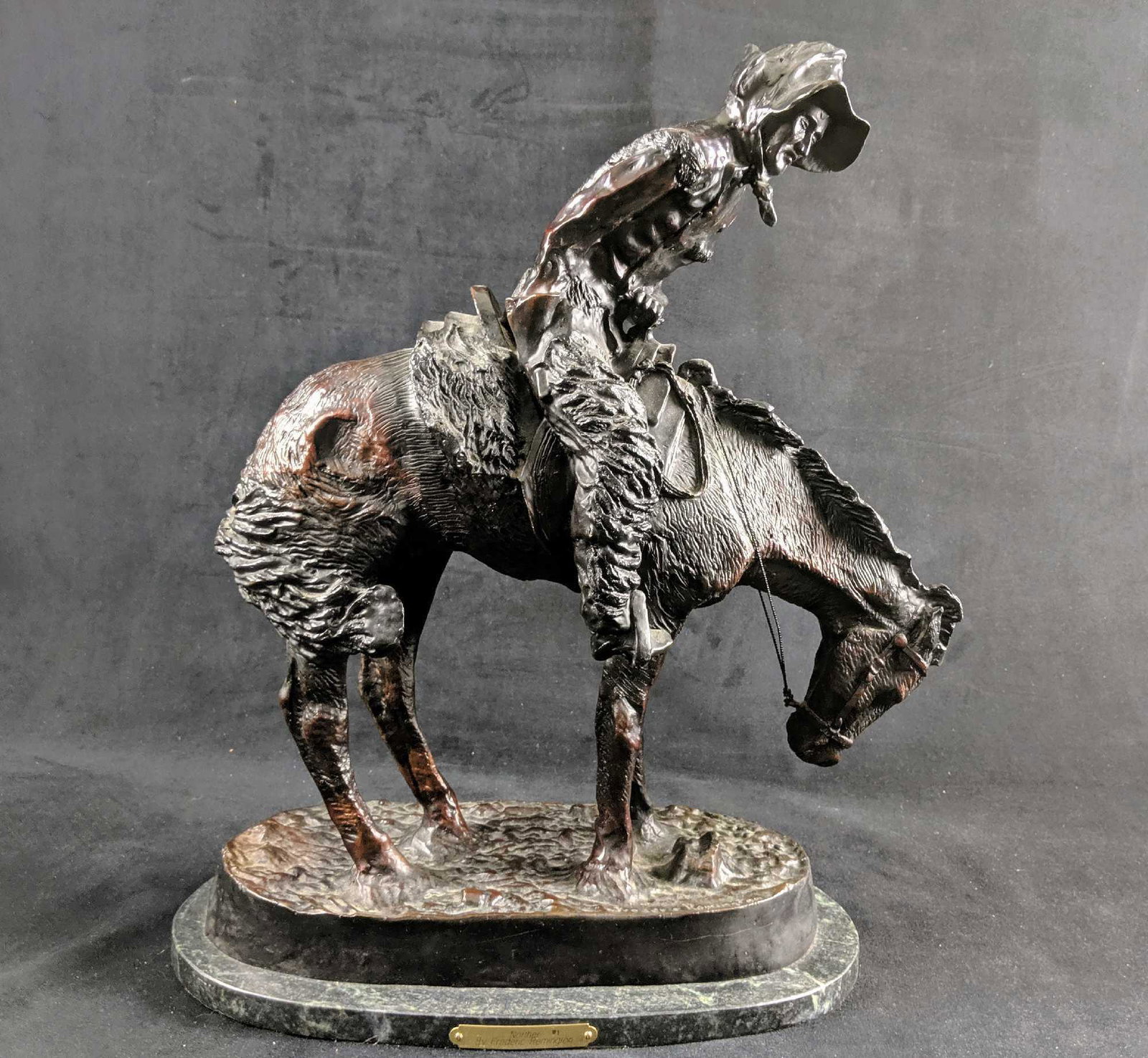 Frederic Remington Bronze Statue The Norther Incredible: This Norther bronze depicts the hard lifestyle of a cowboy in the colder seasons. In a successful attempt to capture the harsh conditions of weather and season on the lives and livelihoods of the west