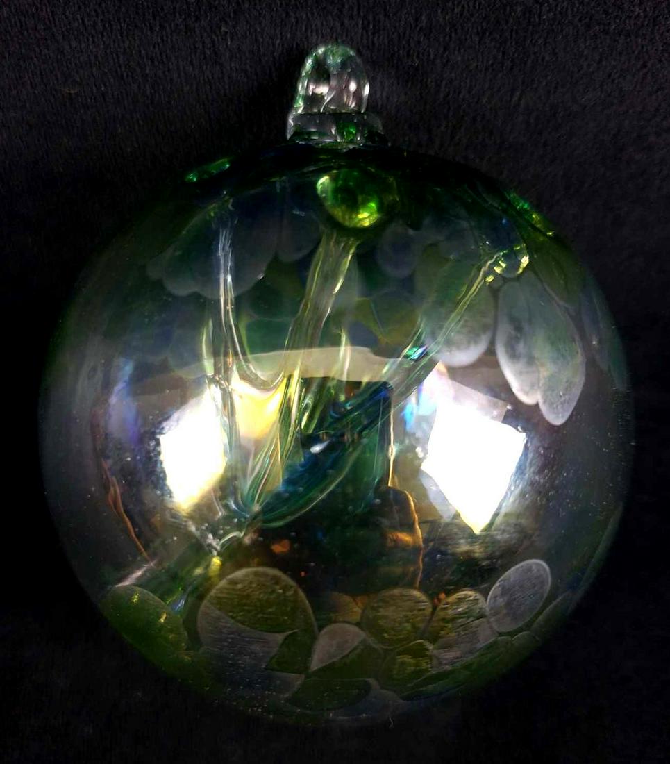 Tree of Life Hand Blown Ornament or Witch Ball: Tree of Life Hand Blown Ornament or Witch Ball. This tree of life ornament is in good to great condition. The ornament has a small 1/4" shallow chip out of the surface towards the bottom. The pigments