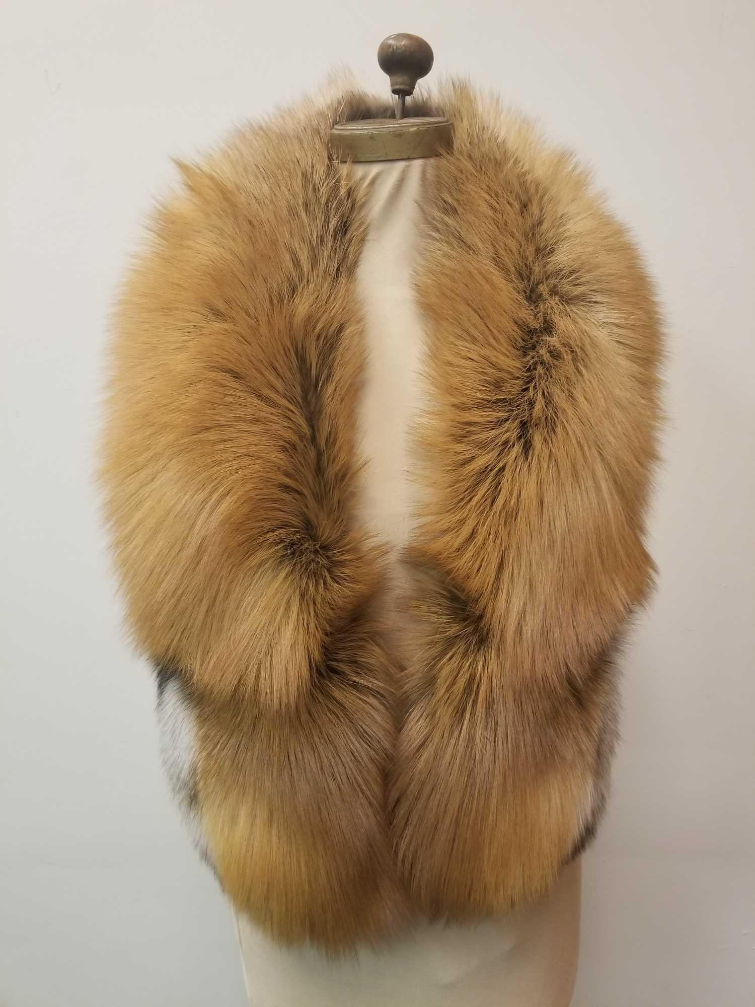 Red Fox Fur Shawl Stole Wrap by Saga Fox: This elegant full red fox shawl by Saga Furs is in excellent condition with no known damages and features dark brown linen interior and a gold toned clip and loop. Measures 54" x 6".Â