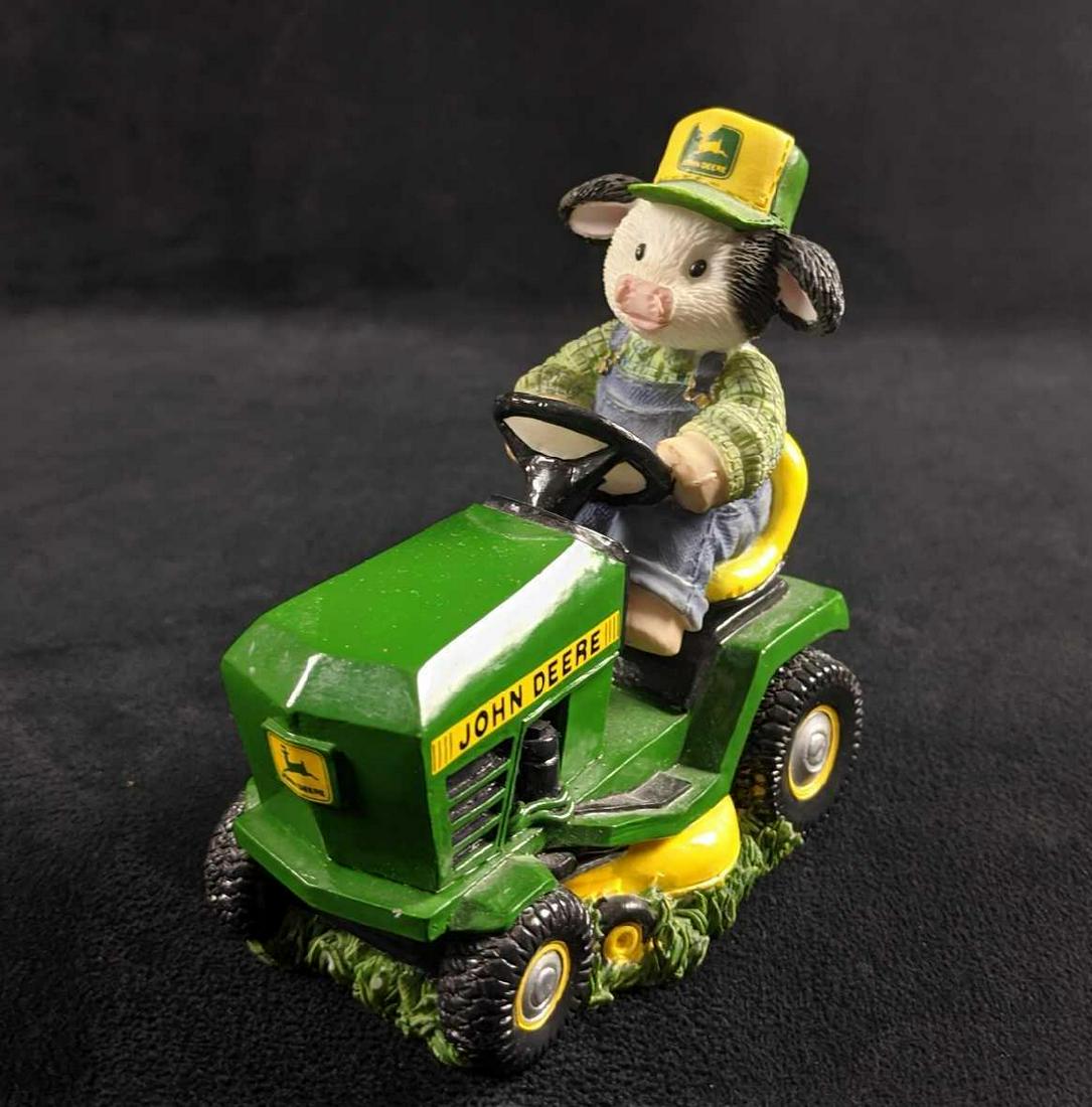 Mary Moo Moos Deere To My Heart John Deere Fig: Cute and colorful hand painted limited edition 'Mary's Moo Moo' resin figure of a farmer cow riding her tractor. Figure is approx 4" x 3" x 5". Figure is in good, used condition with a small chip on t
