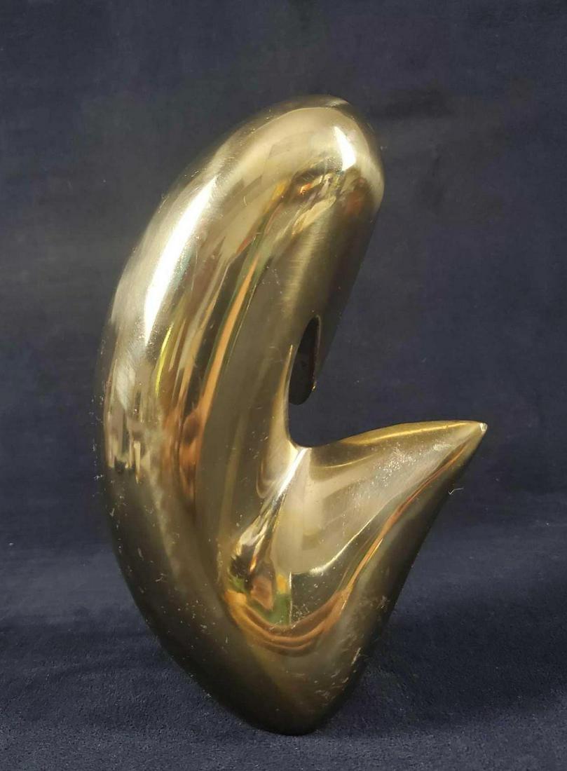 Abstract Bronze Statue Glossy Paperweight: Rather heavy hollow bronze abstract statue which would also make an ideal paperweight. The abstract figure resembles a mother/woman looking down at her child. Take a look at it and see what you can pi