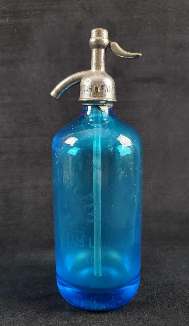 Vintage Turquoise Blue Czech Glass Seltzer Bottle: HeavyÂ turquoise blue bottle from the 1940/1950's. Made in Czechoslovakia. "Country Wide Bevs' is etched on glass. Is topped by a metalÂ soda siphon/seltzer top. This is marked 'Country Wide Bevs 