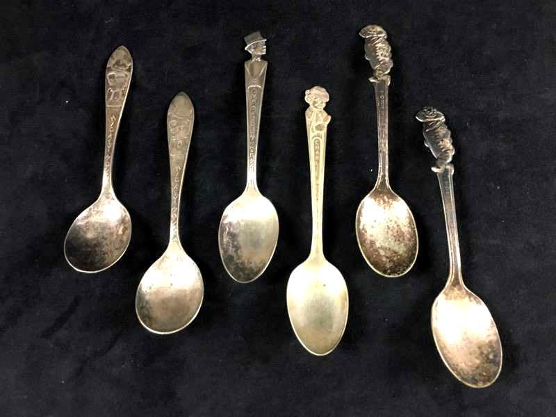 Six Vintage Cereal Premium Spoons Including Mickey: Six Vintage Cereal Premium Spoons Including Mickey Mouse, Charlie McCarthy, and Tony the Tiger; two of each character, all are marked "Silver Plate". The Mickey and Charlie McCarthy spoons date from t