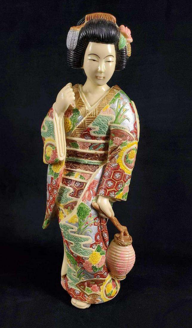 Traditional Geisha Woman Resin Statue: This is one very heavy statue of an traditional Geisha woman holding a basket/lantern. Detailed and textured Kimono is covered with colorful flowers and assorted symbols. Figure is in good, vintage co