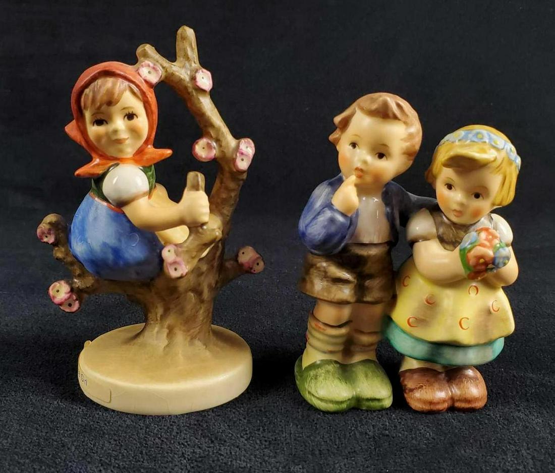 Hummel Figurine Apple Tree Girl And We Congratulate: This lot includes two Hummel figures by Goebel. Both are in good, vintage condition with only some very minor wearing on bottom of the base unless noted in the listing below. Both are made in West Ger