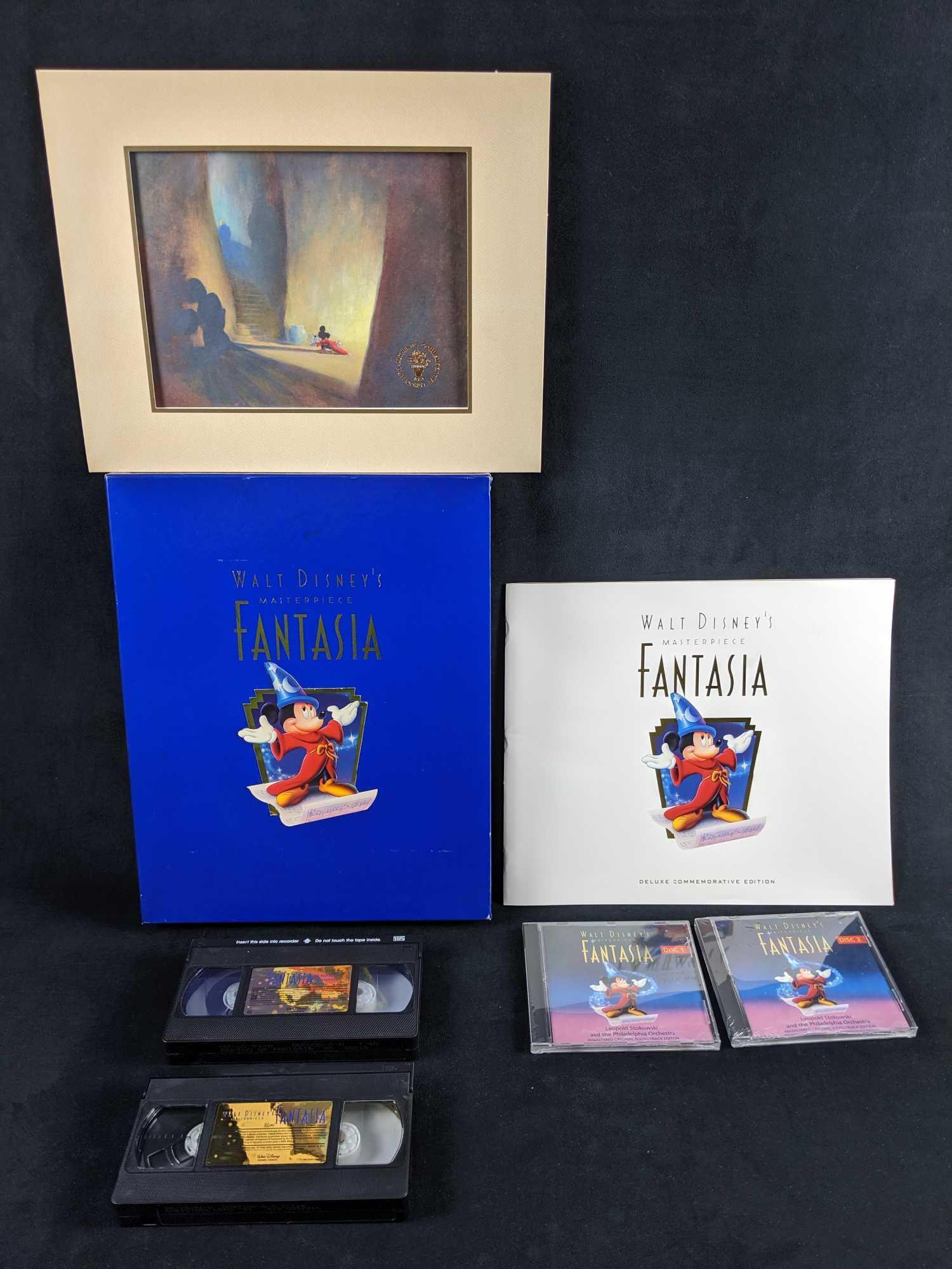 Walt Disneys Fantasia Collectors Ed VHS Box Set Litho: Comes with two untested VHS tapes (Fantasia and a making of), two set CD soundtrack,Â Collectible Lithograph, booklet and COA. Box is approx 12" x 2" x 15". Lithograph is approx 14" x 11 (image is a