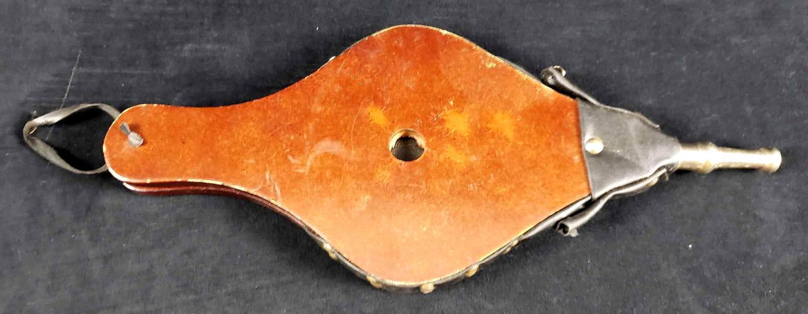 Vintage Fireplace Bellows: Vintage Fireplace Bellows. This fireplace bellows is in good used condition. The bellows shows signs of wear/age such as surface scratches and residue/dust. It is in working order and air flows freely