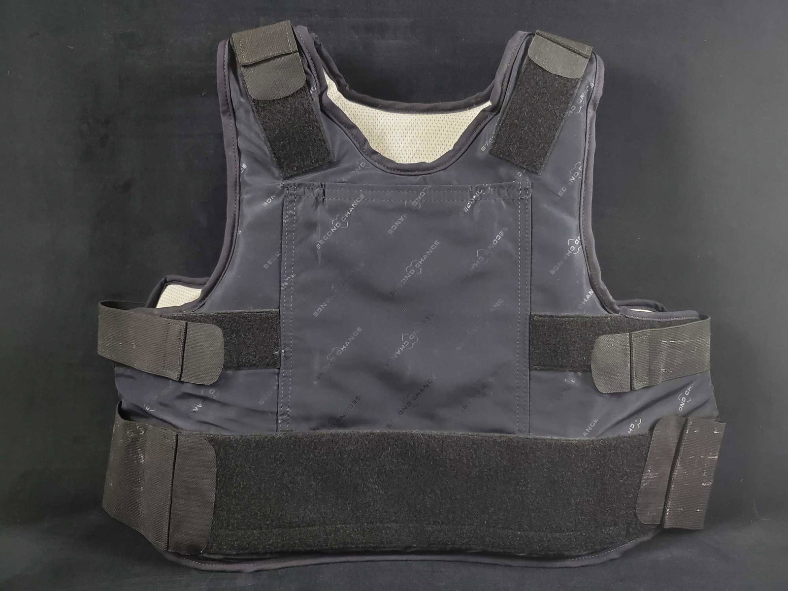Low Vis Concealable Body Armor Bullet Resistant Vest: Please note, this is not bullet proof, but bullet resistant. Size is XXL, which according to the company web site is: 47 Total Girth, 16" Center Front Length, 18"Â Â Front Side Length and 18" back