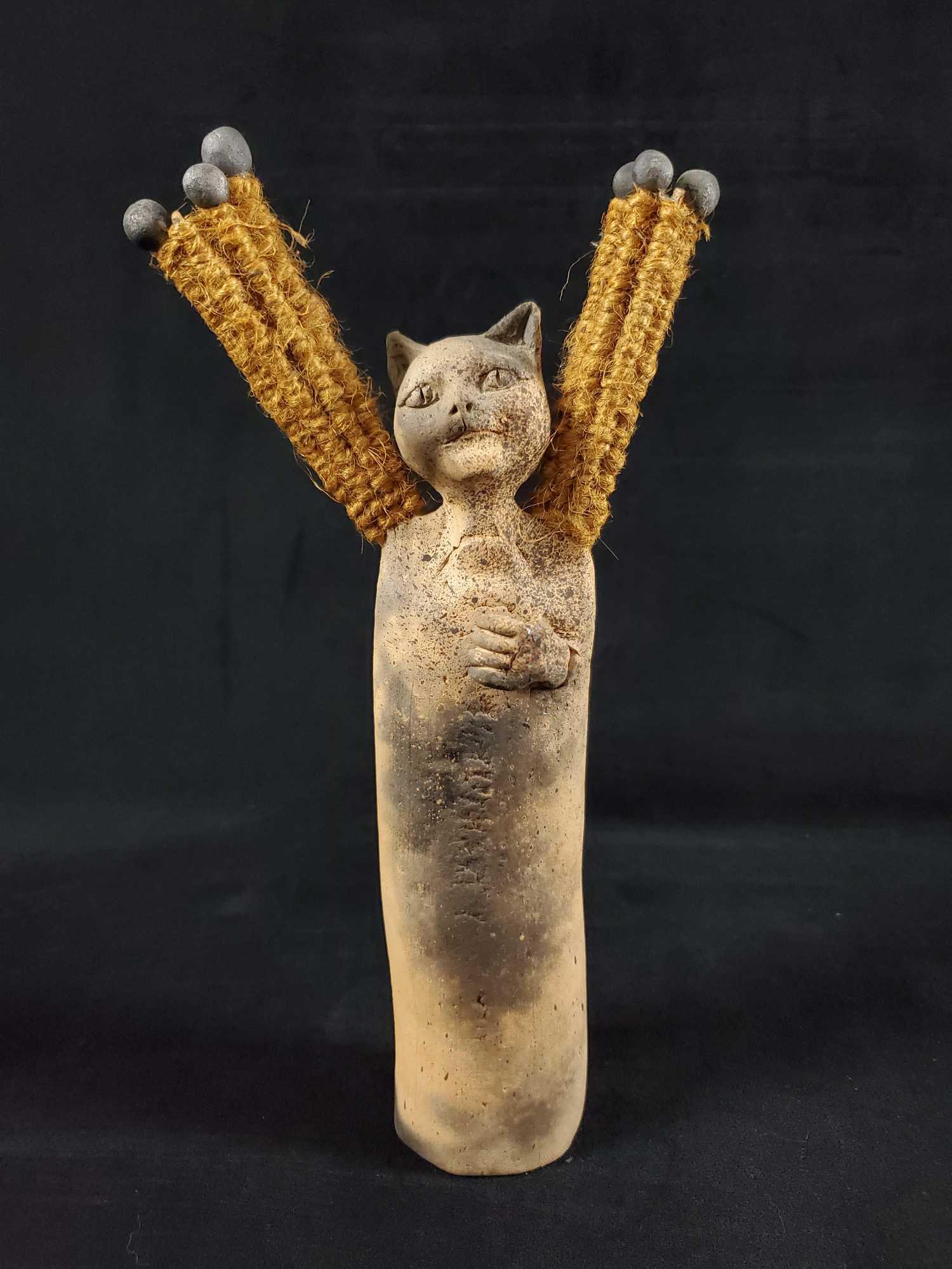 Hand Made Clay Bastet Statue: Hand made cat/BastetÂ figure.Â Bastet or Bast. "She of the Ointment Jar", was a goddess of ancient Egyptian religion, worshiped as early as the Second Dynasty (2890 BCE). Her name also is rendered