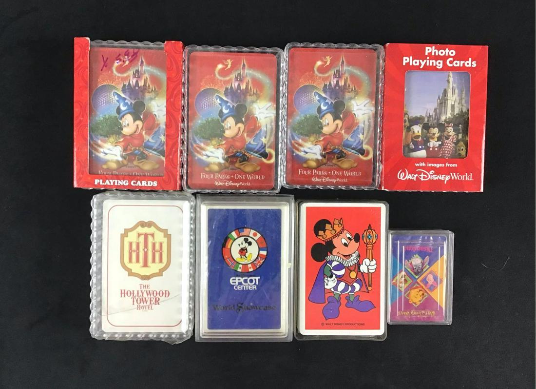 Lot of 8 Walt Disney Playing Cards: This lot consists of a eight playing cards. They vary in condition from excellent to worn with discoloration. In total this lot consists of the following; (1) 4 Walt Disney World playing cards (1) 1 D