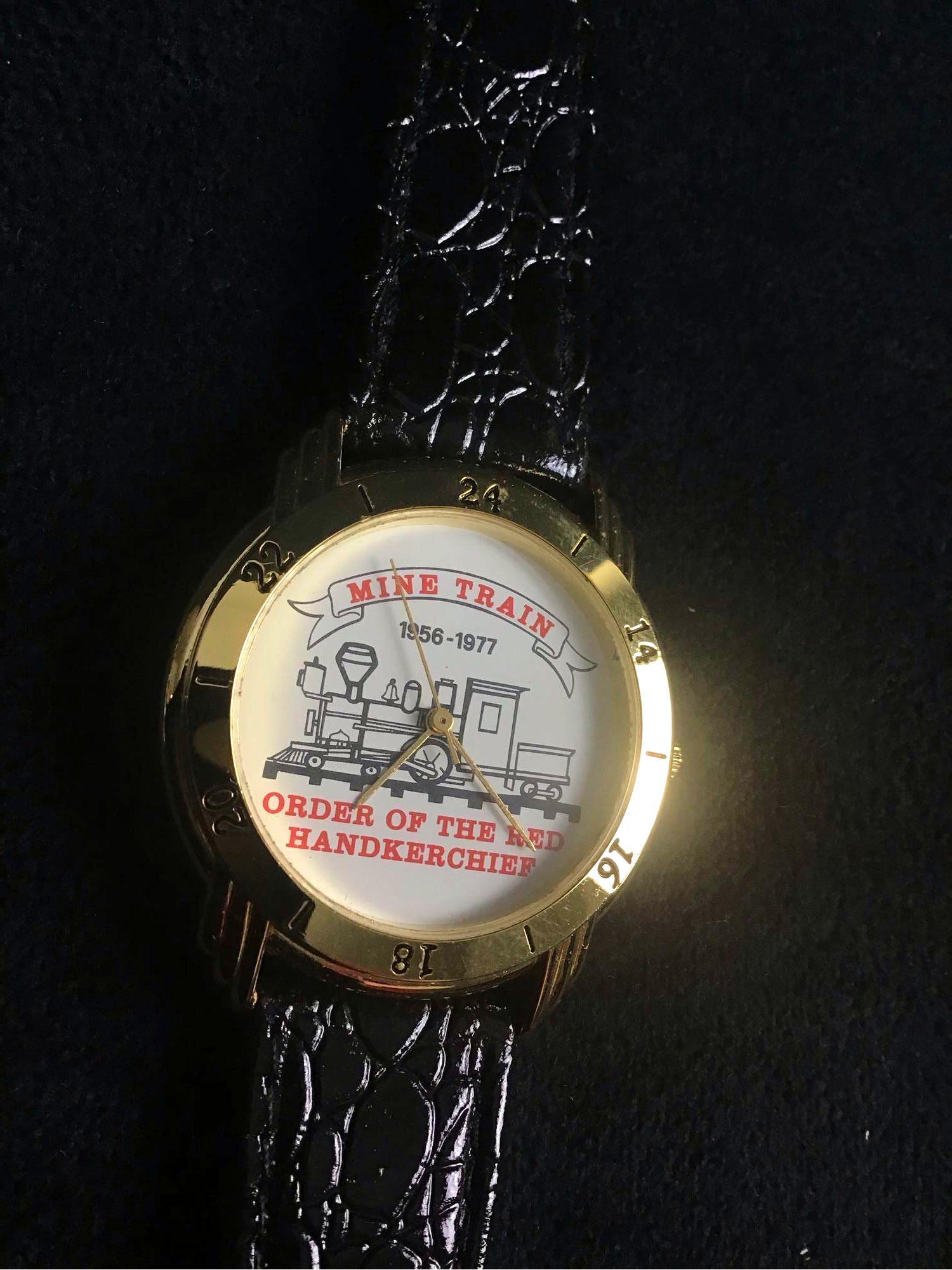 Walt Disney Mine Train Order of the Red Handkerchief: This is a rare unused 83/200 Disney watch. The order of the red handkerchief is well known in through the Disney community. They were a group consisting of original mine train cast members who wore re