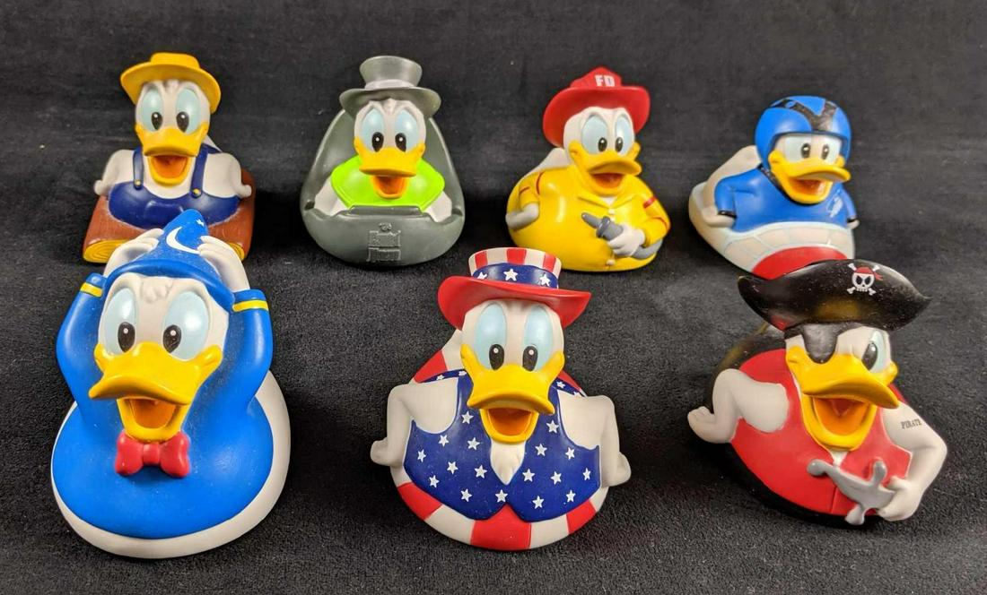 Disney Flock Of Rubber Donald Duck Duckies Lot Of Six: This flock of Rubber Duckies consists of Disneyworld/Disneyland themed Donald Ducks dressed for: Splash Mountain, Haunted Mansion, Pirates Of The Caribbean, and Space Mountain. And job themed ducks li