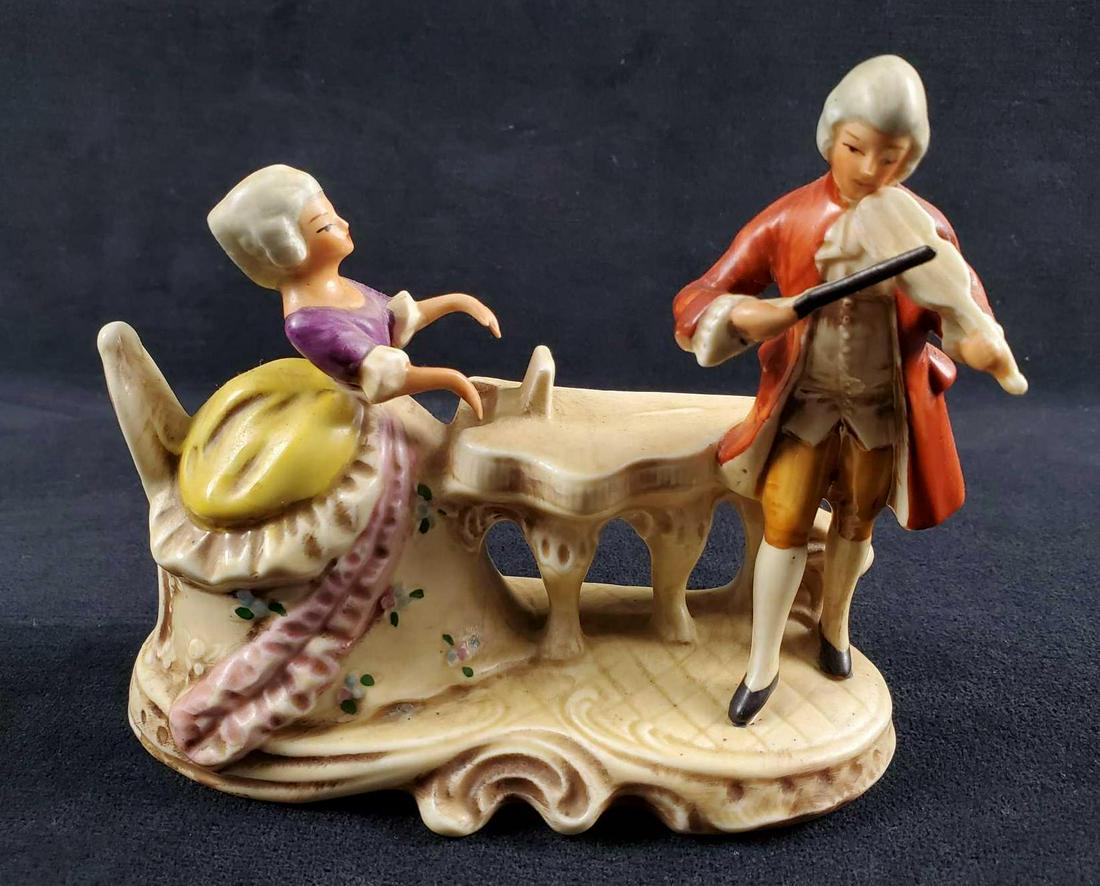 Vintage Grafenthal German Porcelain Figurine: Hand painted German porcelain figurine of anÂ Musical Couple(Piano/Violin) byÂ Grafenthal. Figurine is approx 6" x 2" x 6". Figure is in good, vintage condition with wearing and slight discolorati