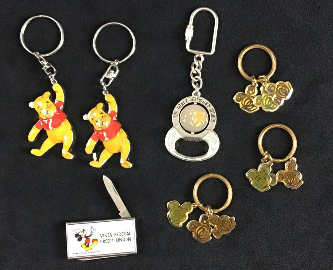 Lot of 7 Walt Disney World 1900s to 2000s Keychains: This is a collection of Walt Disney World keychains. They are in good condition. Some may have known scuffs. In total this lot consists of the following; (1) 2 Winnie the Pooh keychains. Approximate m